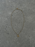 Christian Dior 16” Gold Plated Rhinestone Logo Pendant Necklace - SYLK