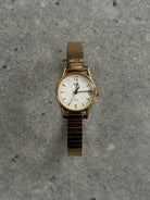 Timex 1990s Round Gold Tone Quartz Watch - SYLK