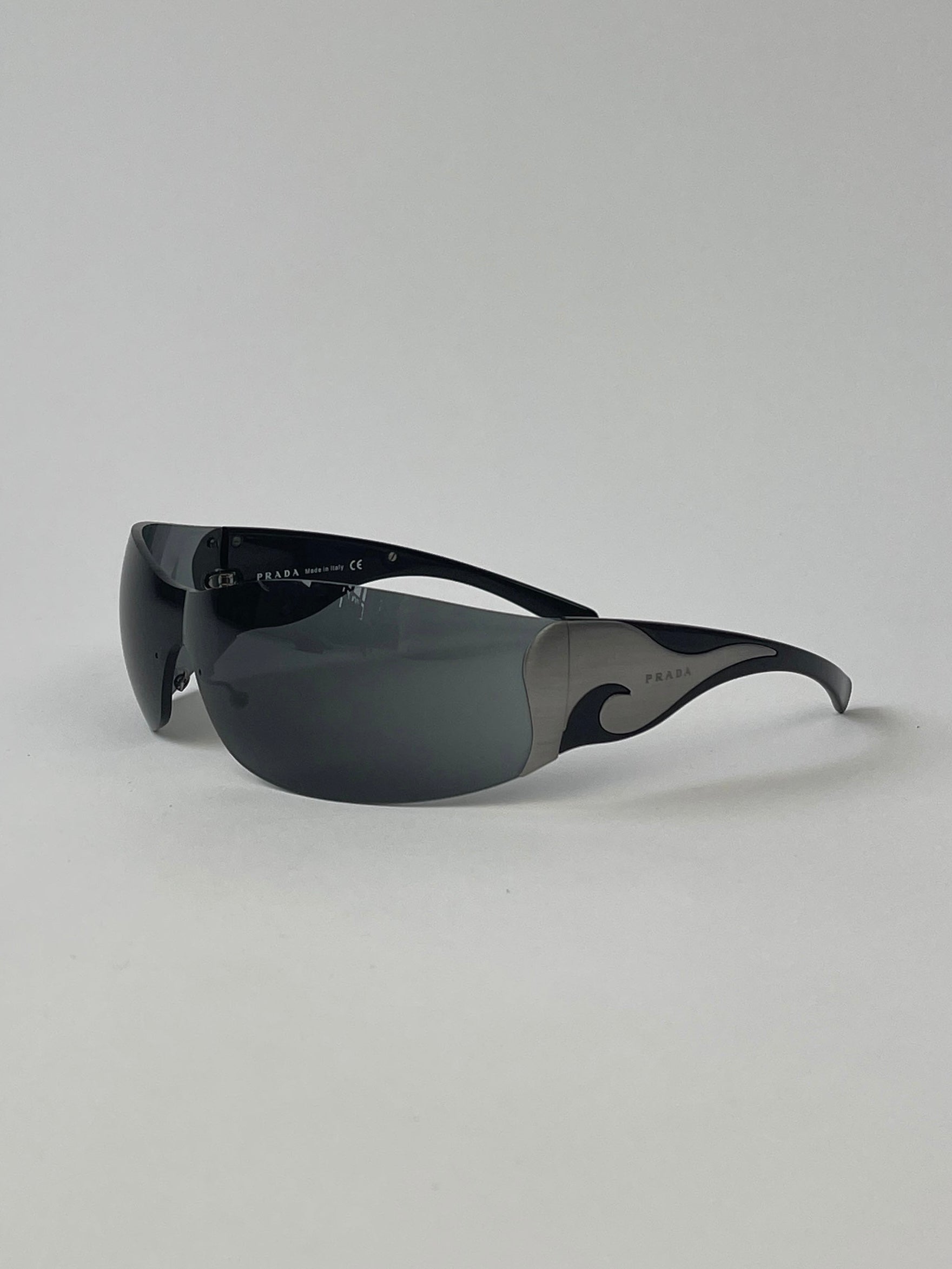 Prada Flame Rimless Wrap Sunglasses - SYLK