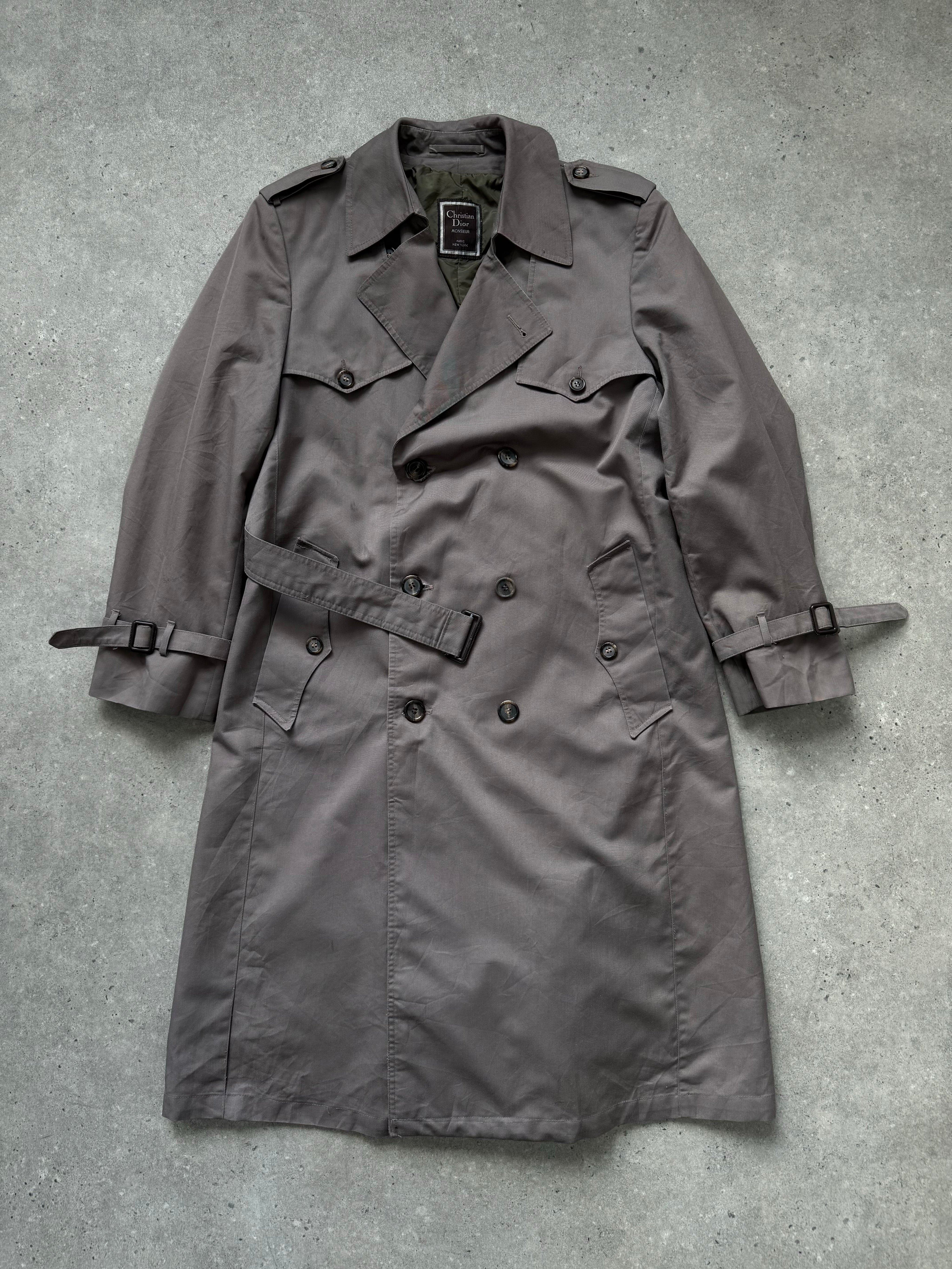Christian Dior Monsieur 1980s double-breasted belted trench coat, beige fabric, classic coat style, front view with collar and buttons.