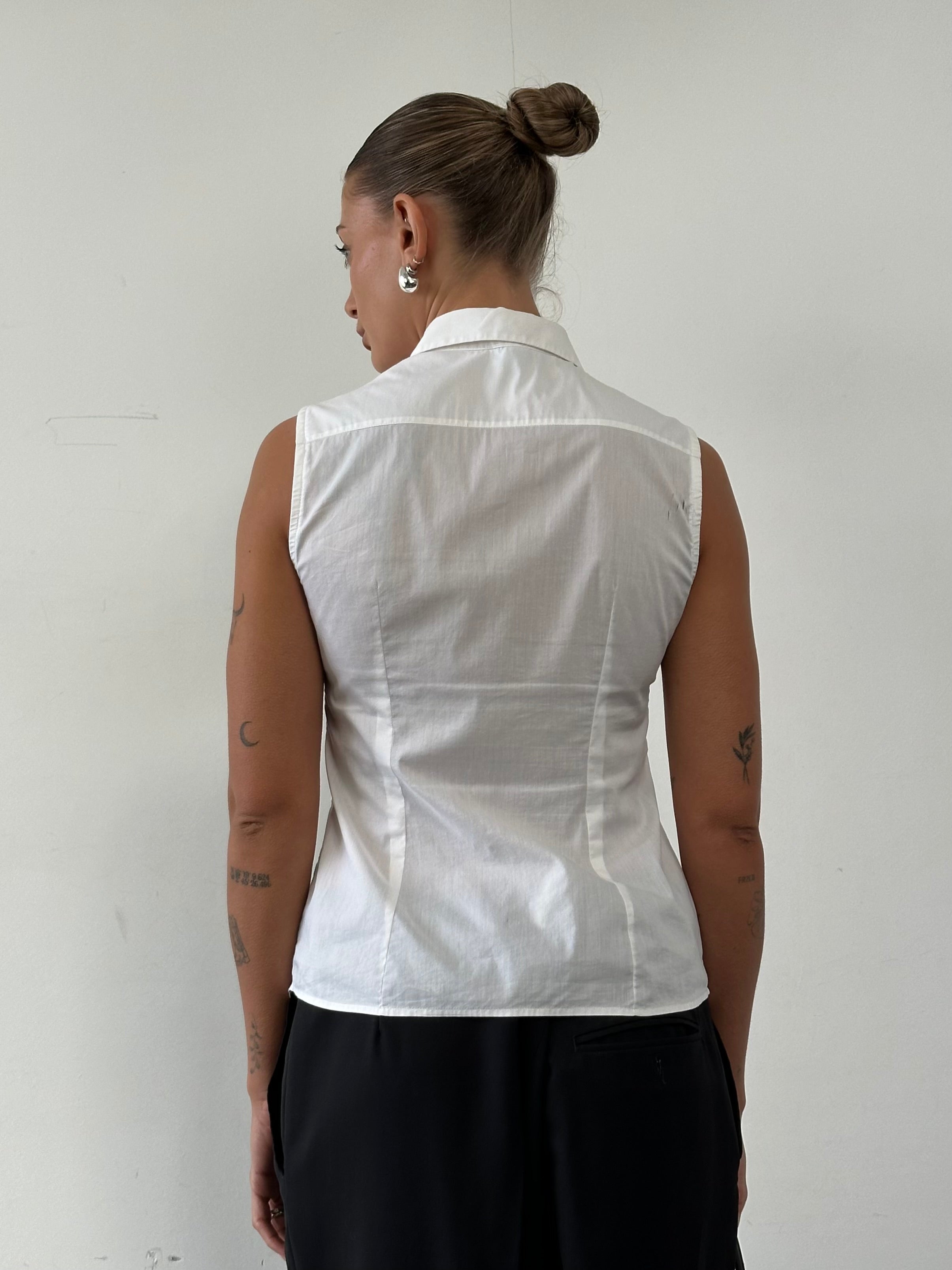 Armani Jeans sleeveless shirt in size small, white cotton with button front and sleeveless design, casual fashion for summer wear.