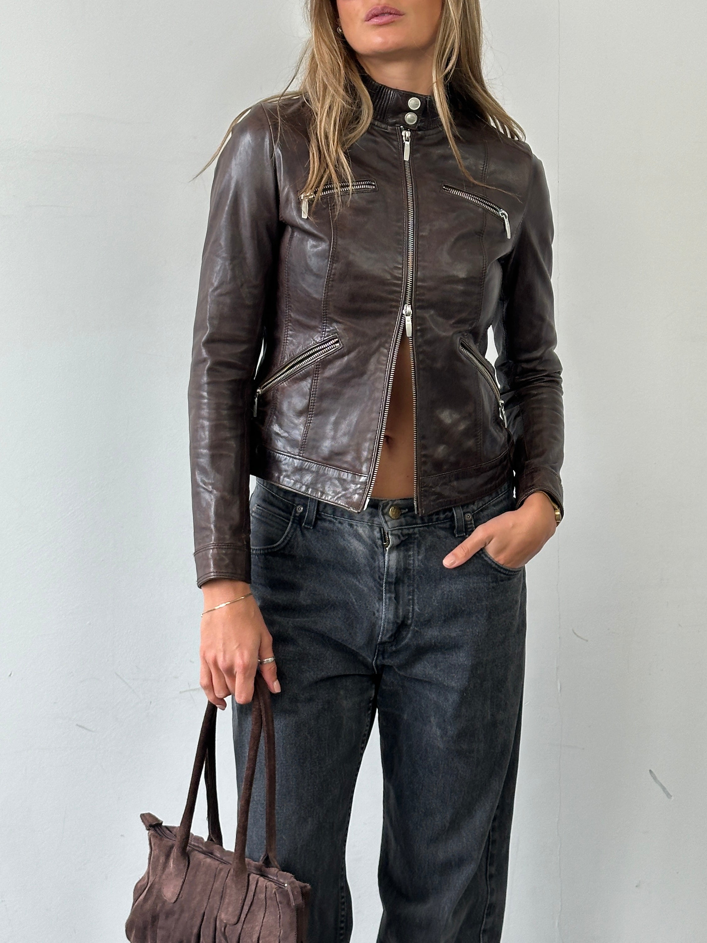 Vintage double zip fitted biker leather jacket in XS/S, featuring classic design, front zippers, and a sleek, vintage leather finish.