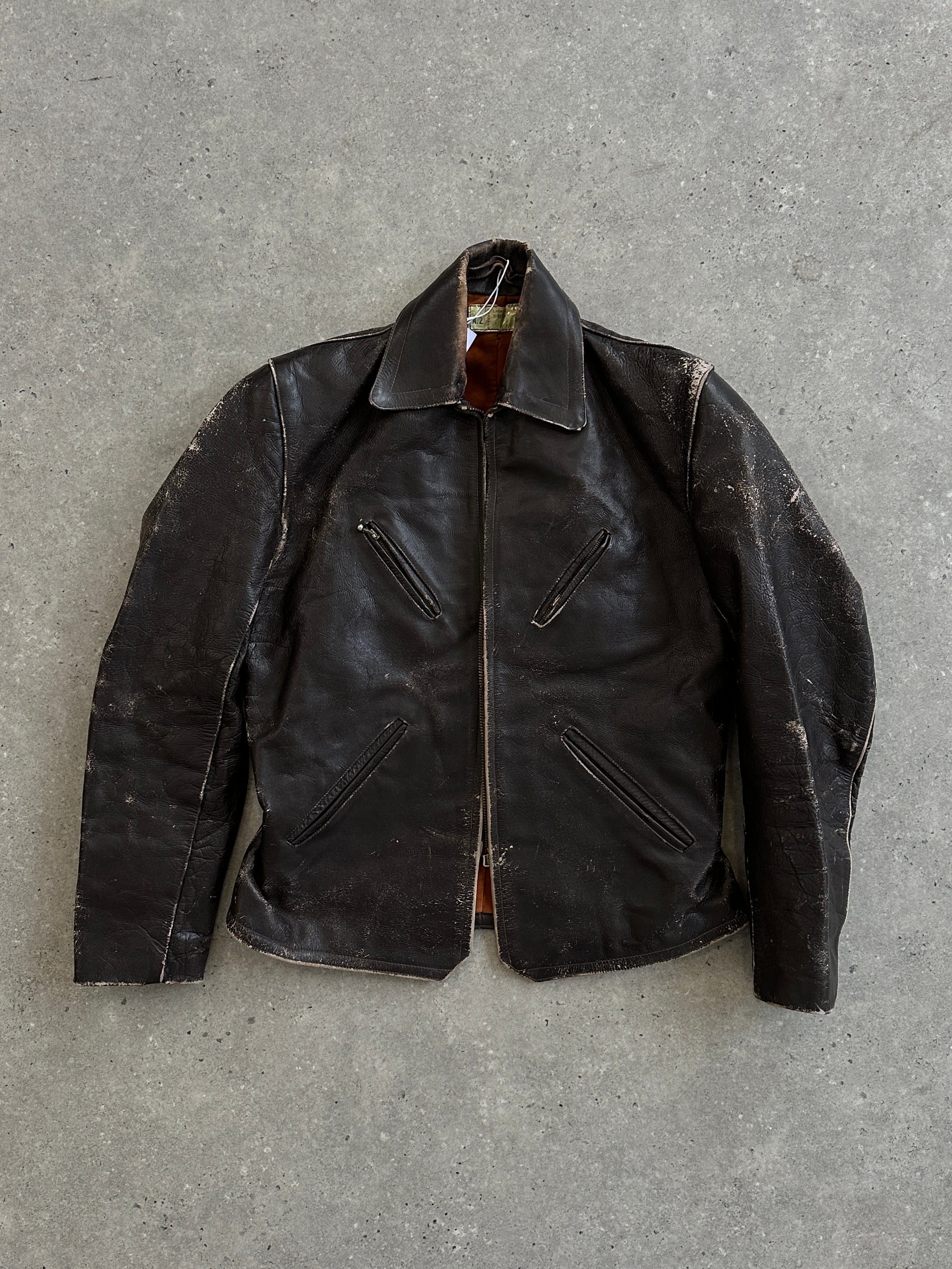 Vintage distressed structured leather jacket in size S/M, featuring rugged texture and classic design, from the Vintage brand.