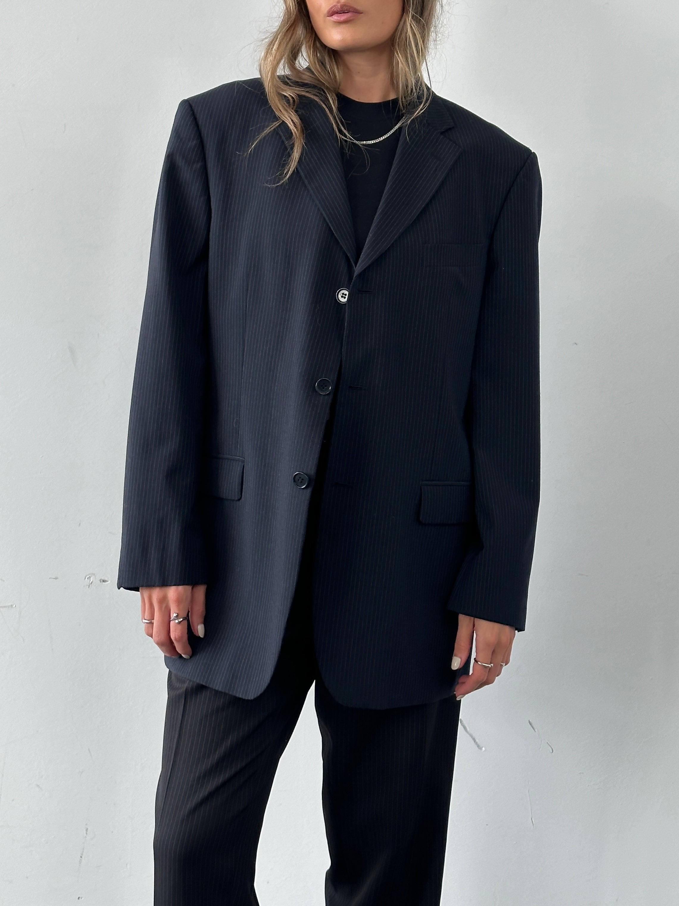 Balmain pinstripe wool blazer in size 42R/XL, single-breasted with notch lapels and tailored fit for a sophisticated look.