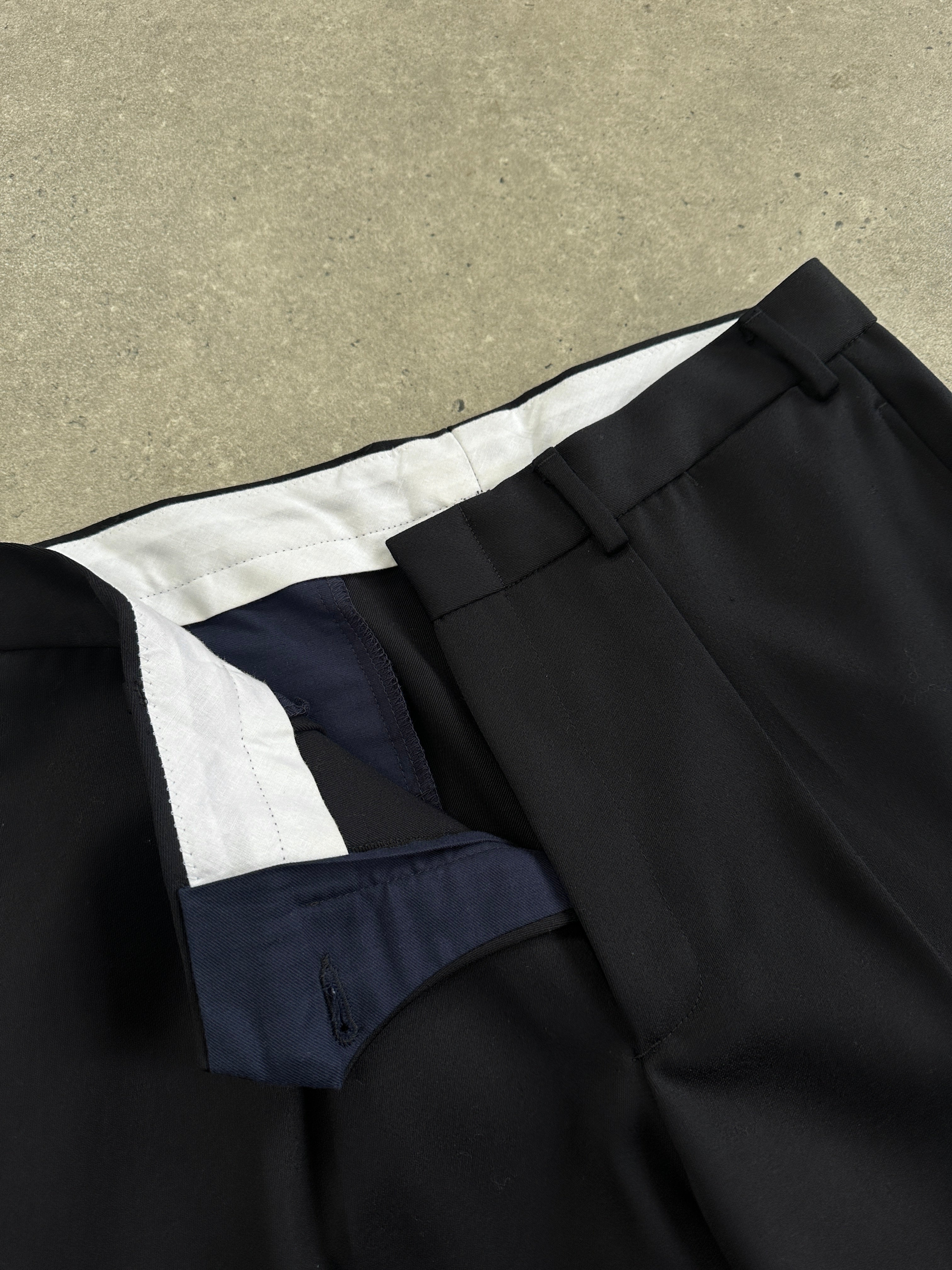 Italian Vintage Pure Wool Tailored Trousers in size W32, featuring classic design and high-quality fabric, displayed on a neutral background.
