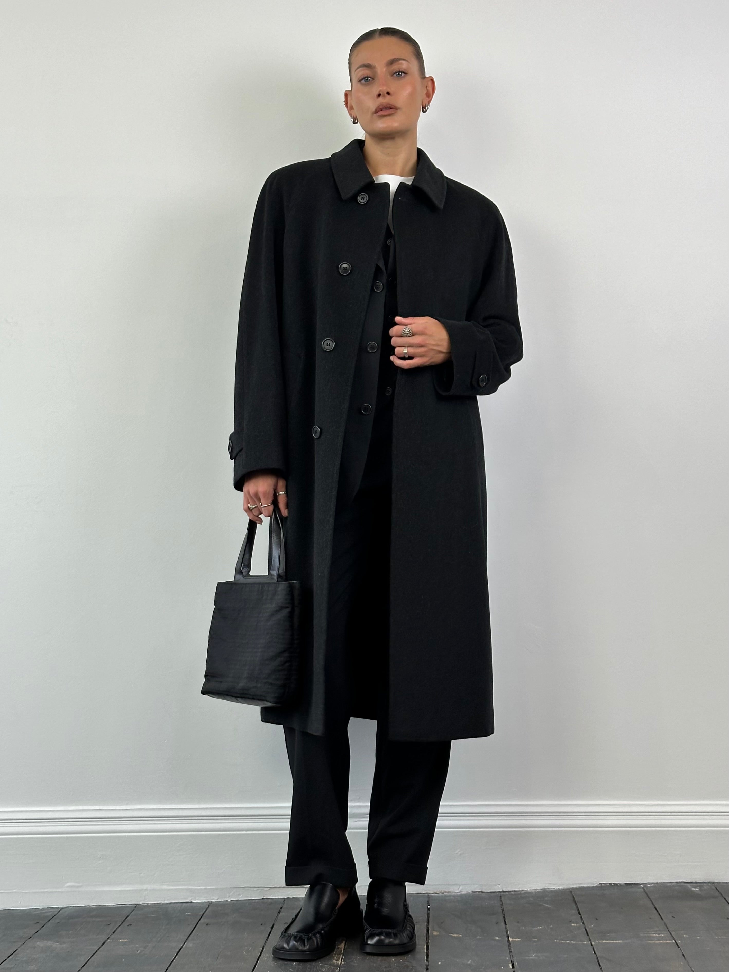 Loro Piana Viola coat in pure virgin wool with concealed placket, shown in XL size, tailored and elegant for cold weather.
