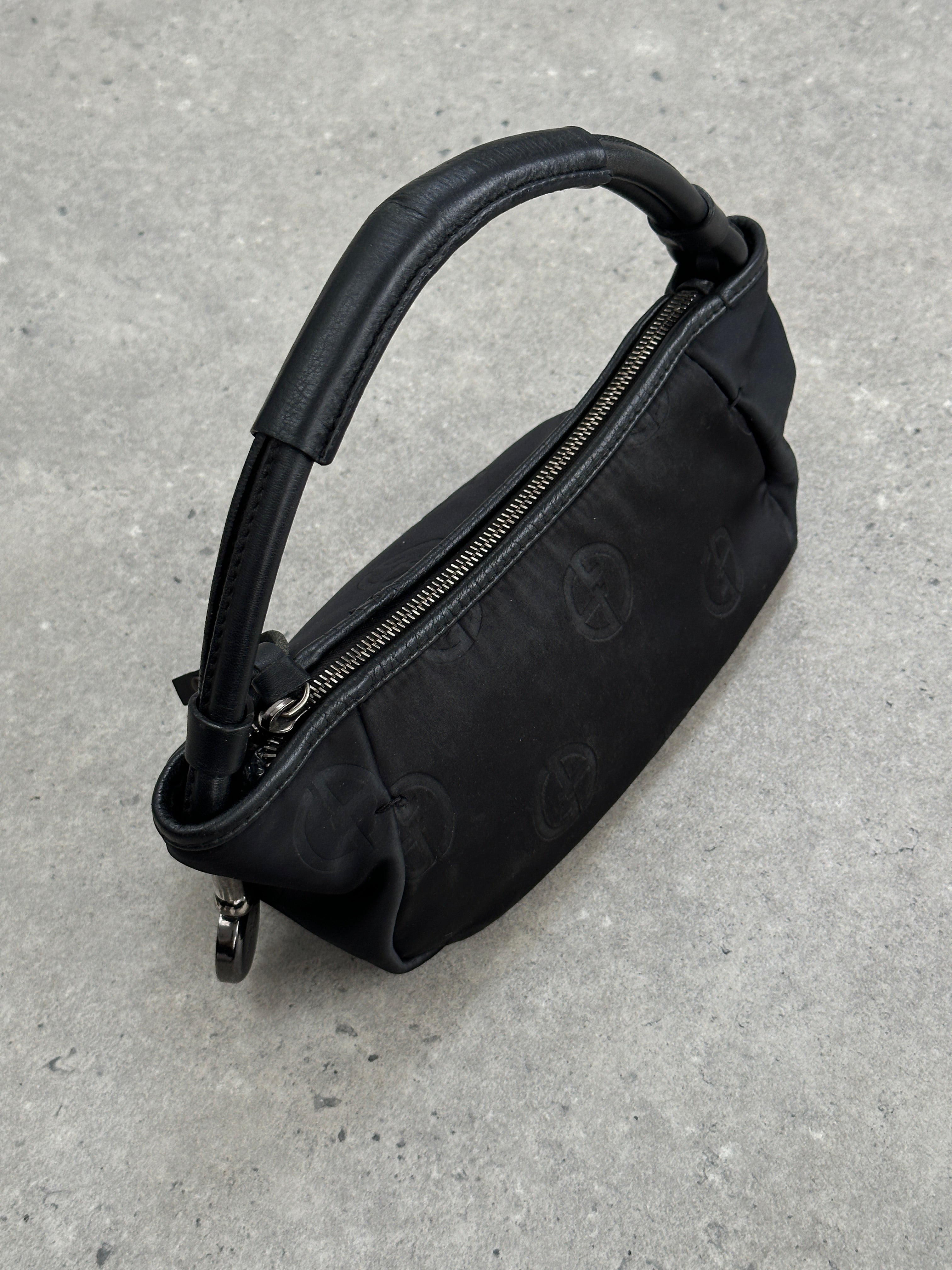 Giorgio Armani GA Monogram Baguette Bag in beige with leather strap and signature logo pattern, stylish designer handbag.