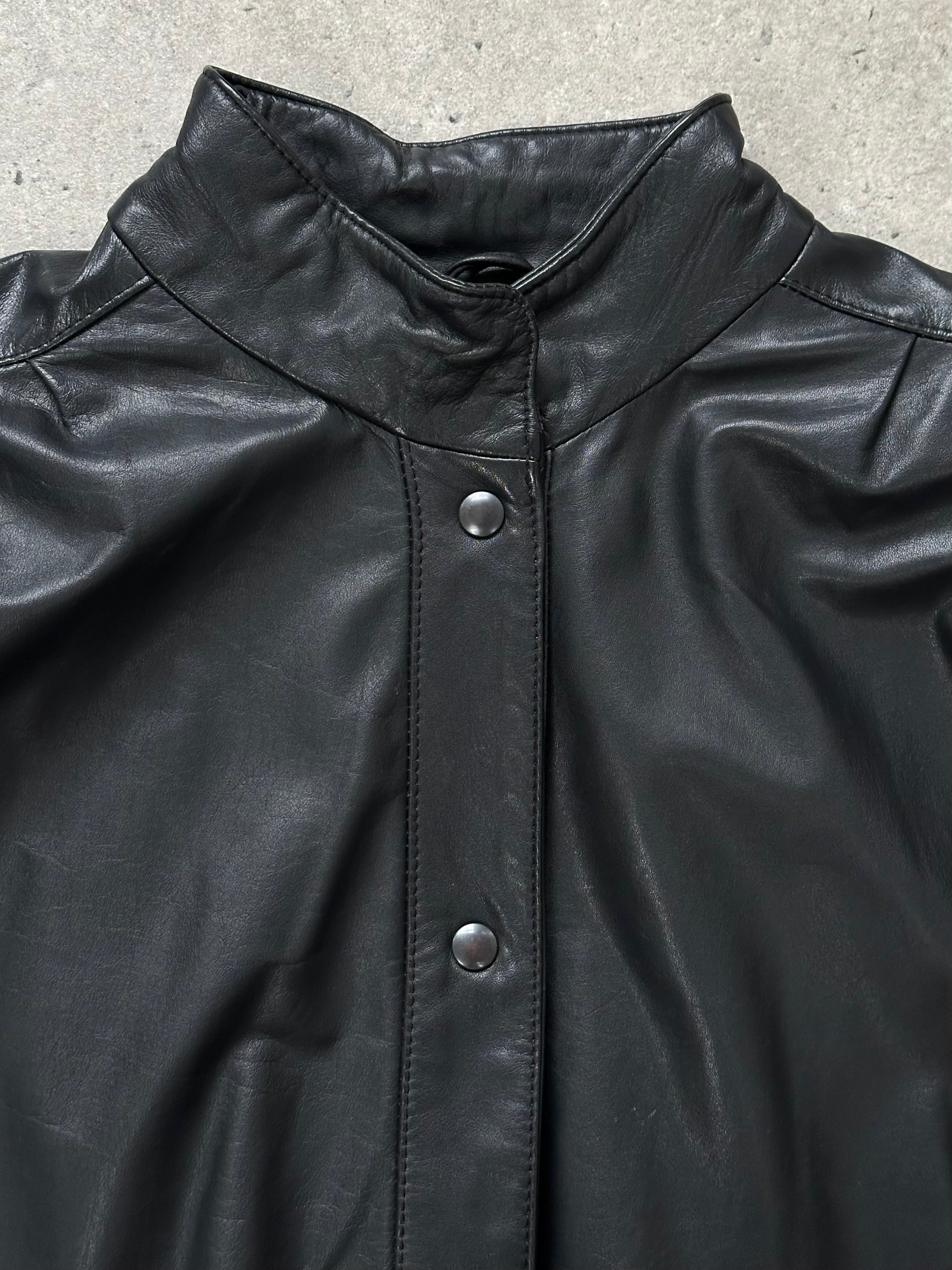 Vintage 1990s leather jacket in size M, classic black leather with a timeless design, displayed on a hanger.