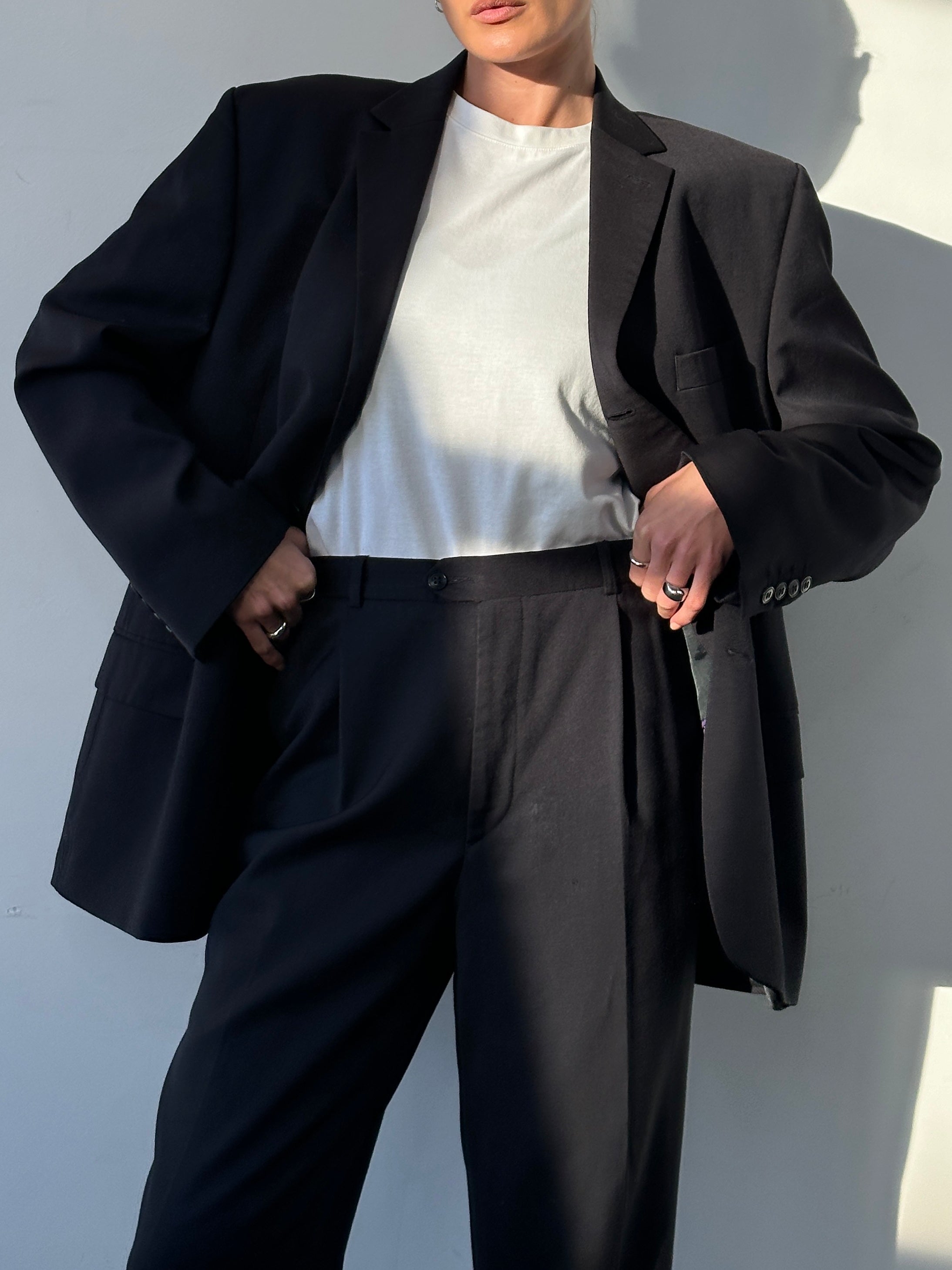 Pierre Cardin pure wool single-breasted suit jumpsuit in size 44S/W32, tailored fit with lapel collar and front button closure.