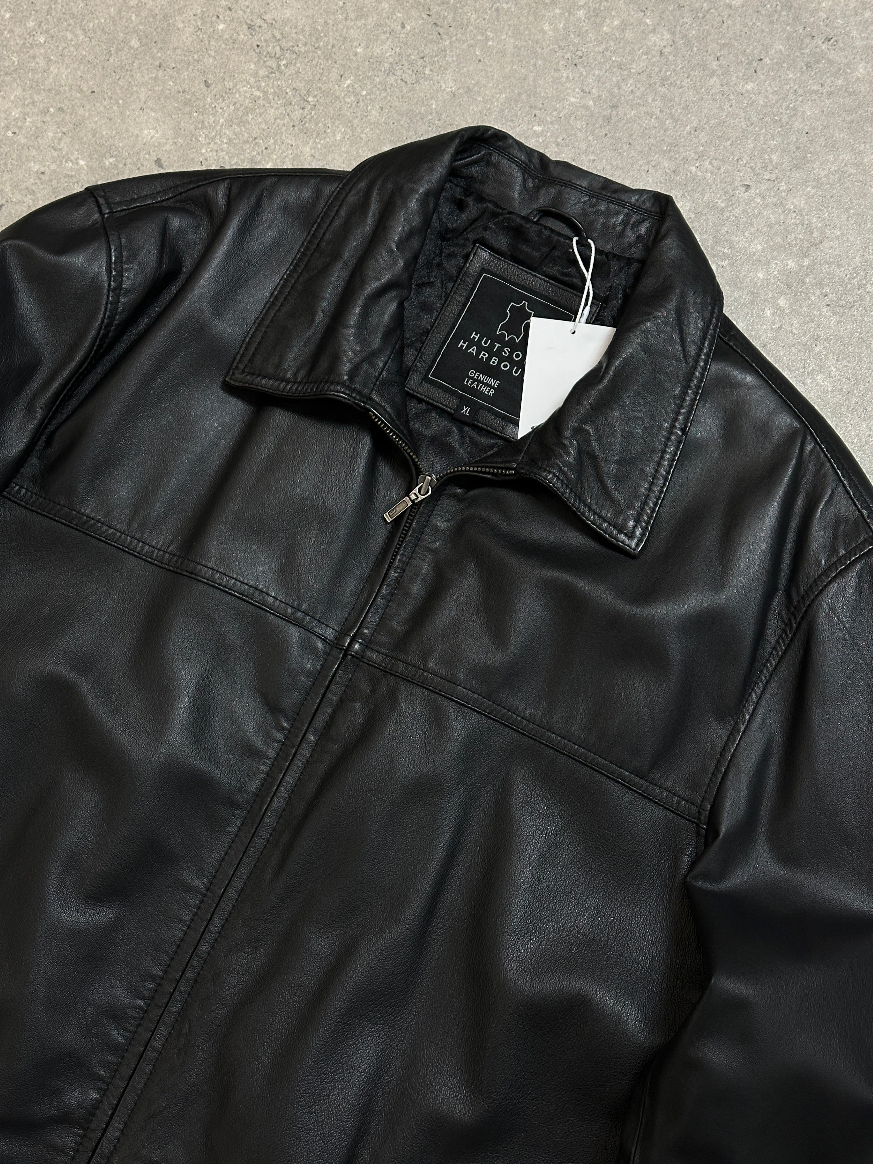 Vintage minimal leather jacket in XL size, featuring a classic design with smooth leather and subtle detailing.