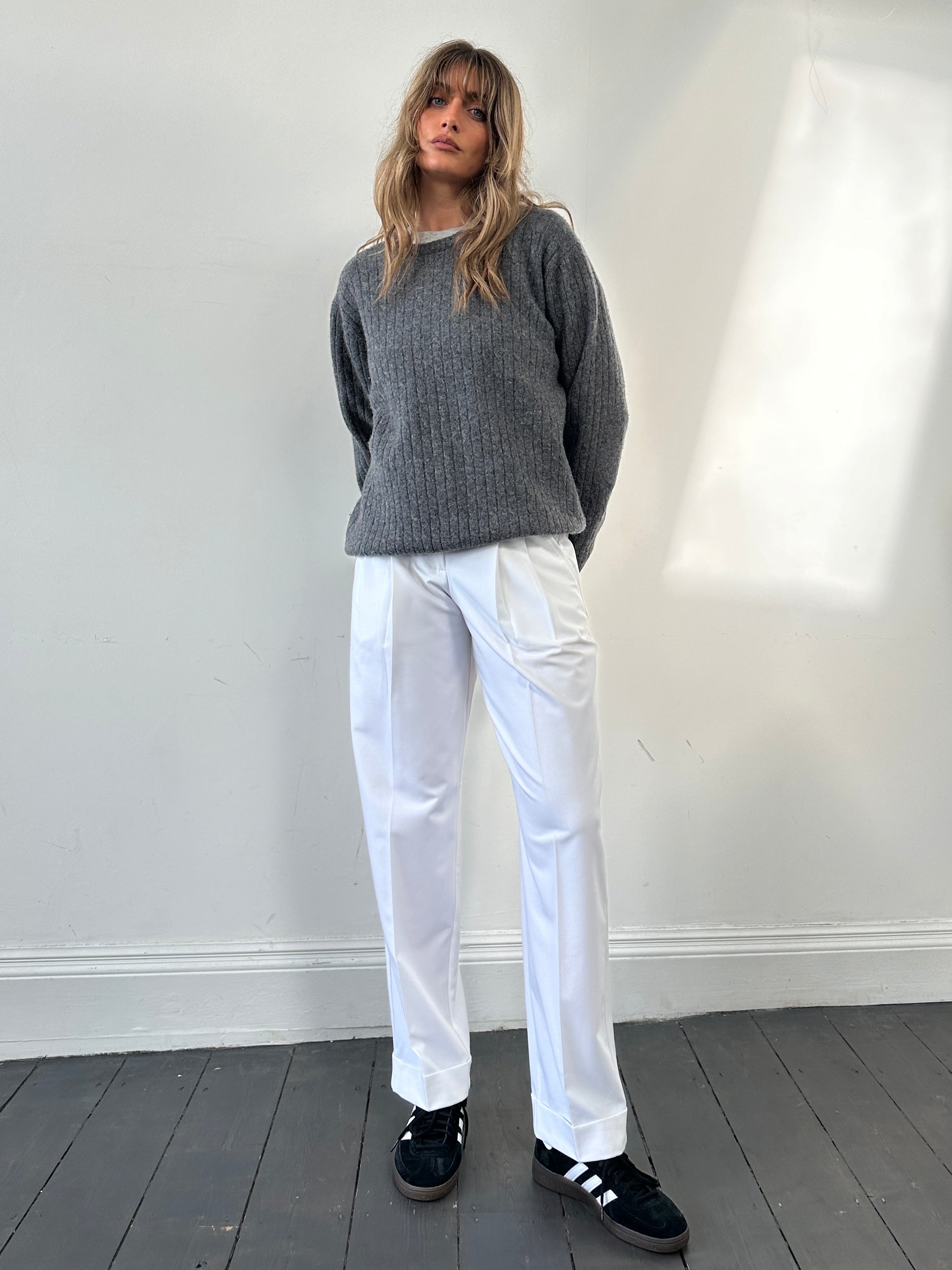 Jaeger wool speckle knit jumper in size L, featuring a cozy textured design with multicolor speckles on soft wool fabric.