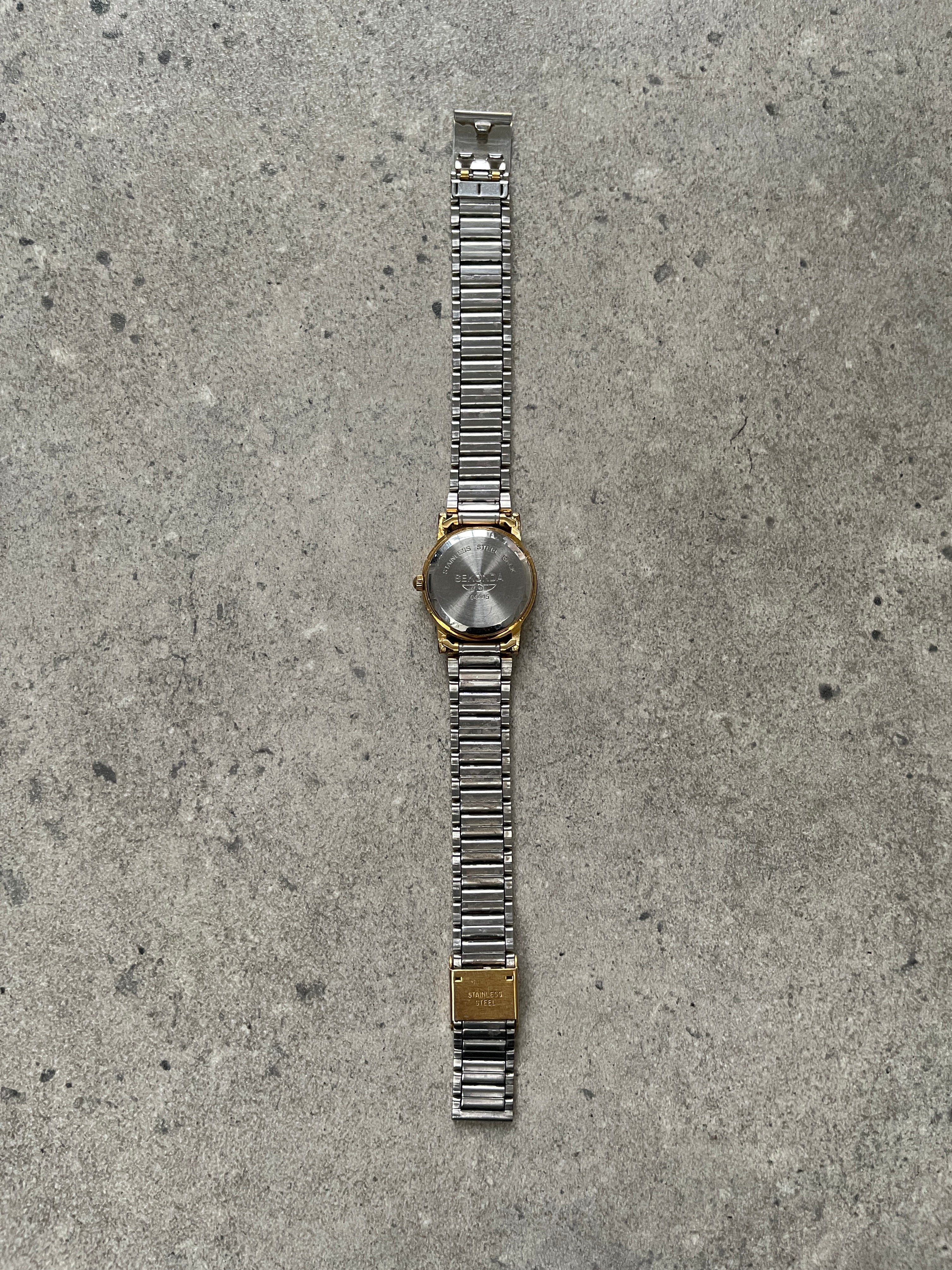 Sekonda 1990s gold-plated quartz bracelet watch with a sleek round dial and classic design.