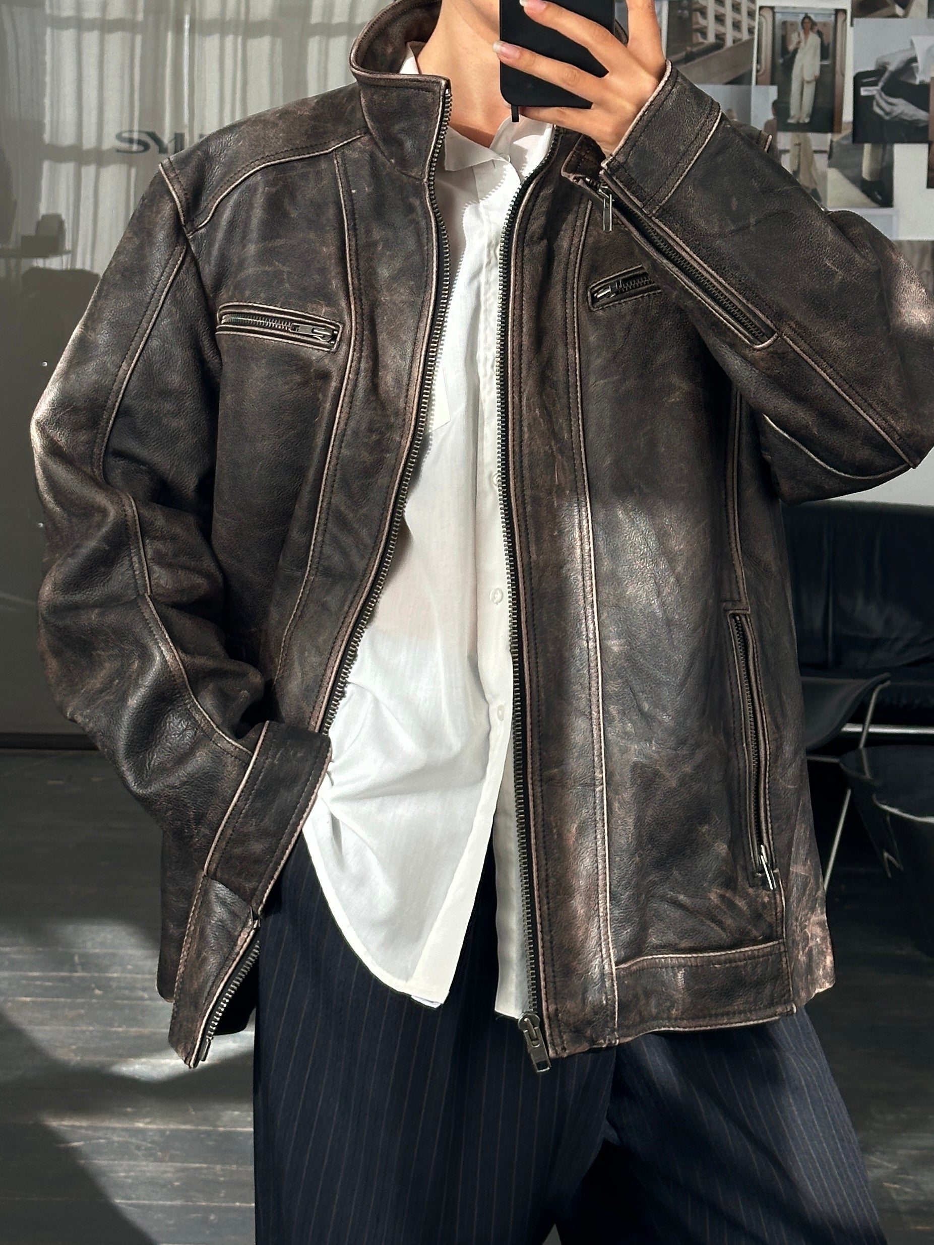 Vintage 2000s distressed high neck leather jacket in XL, featuring a rugged design and classic vintage style.