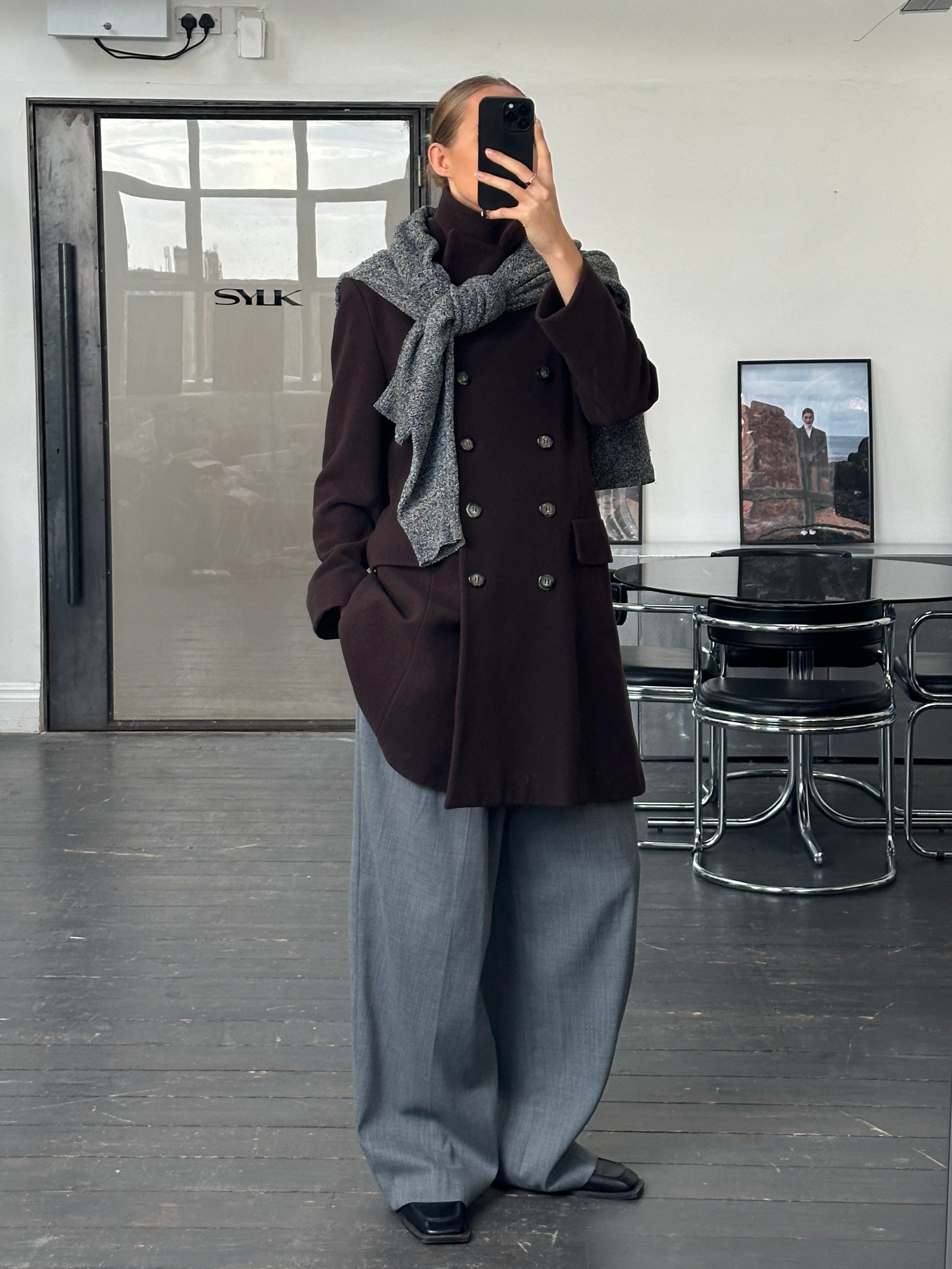 Vintage 1990s wool and cashmere double-breasted coat, medium size, featuring classic tailored design and textured fabric.