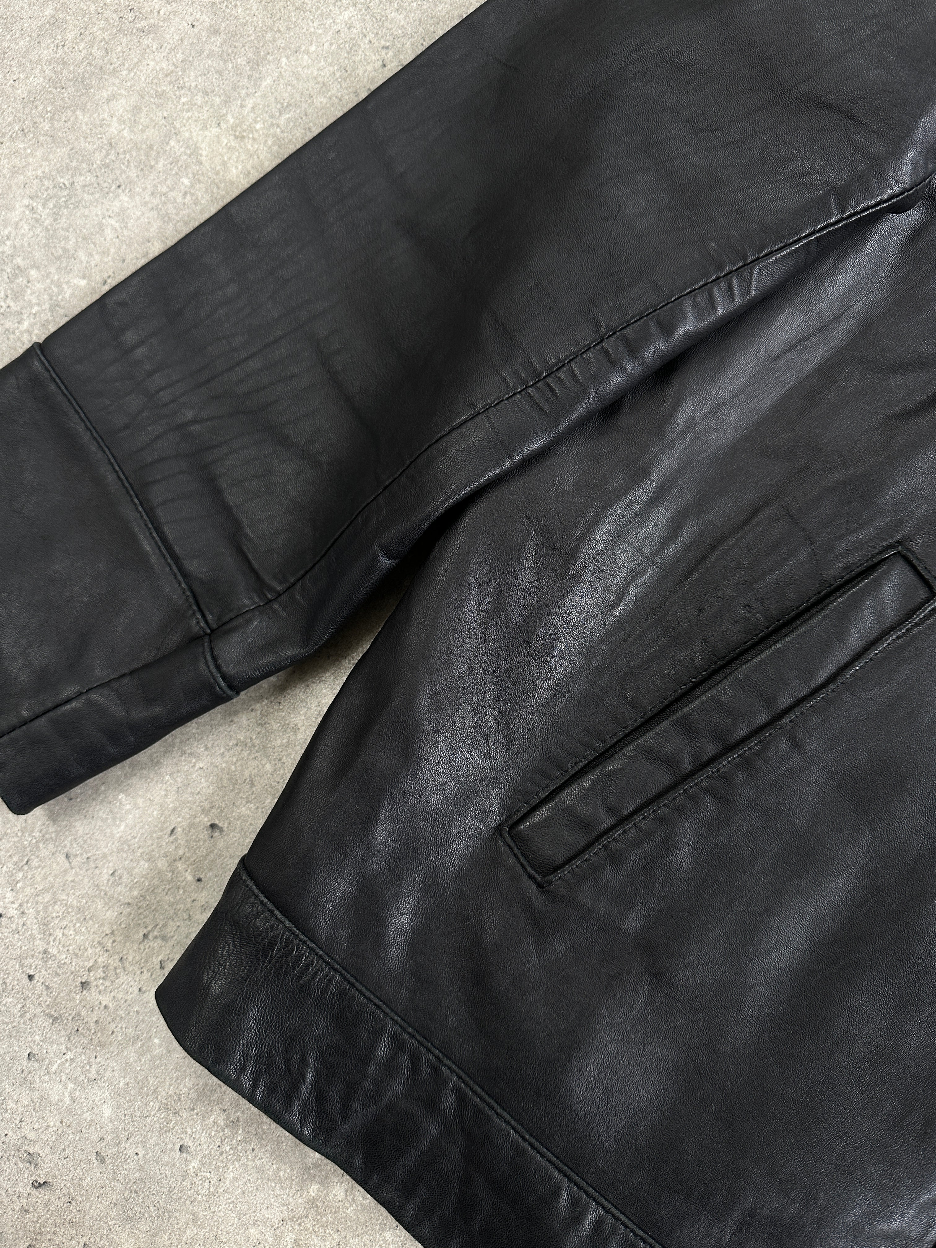 Balmain smooth leather jacket in XL size, showcasing sleek black leather with tailored fit and classic design details.