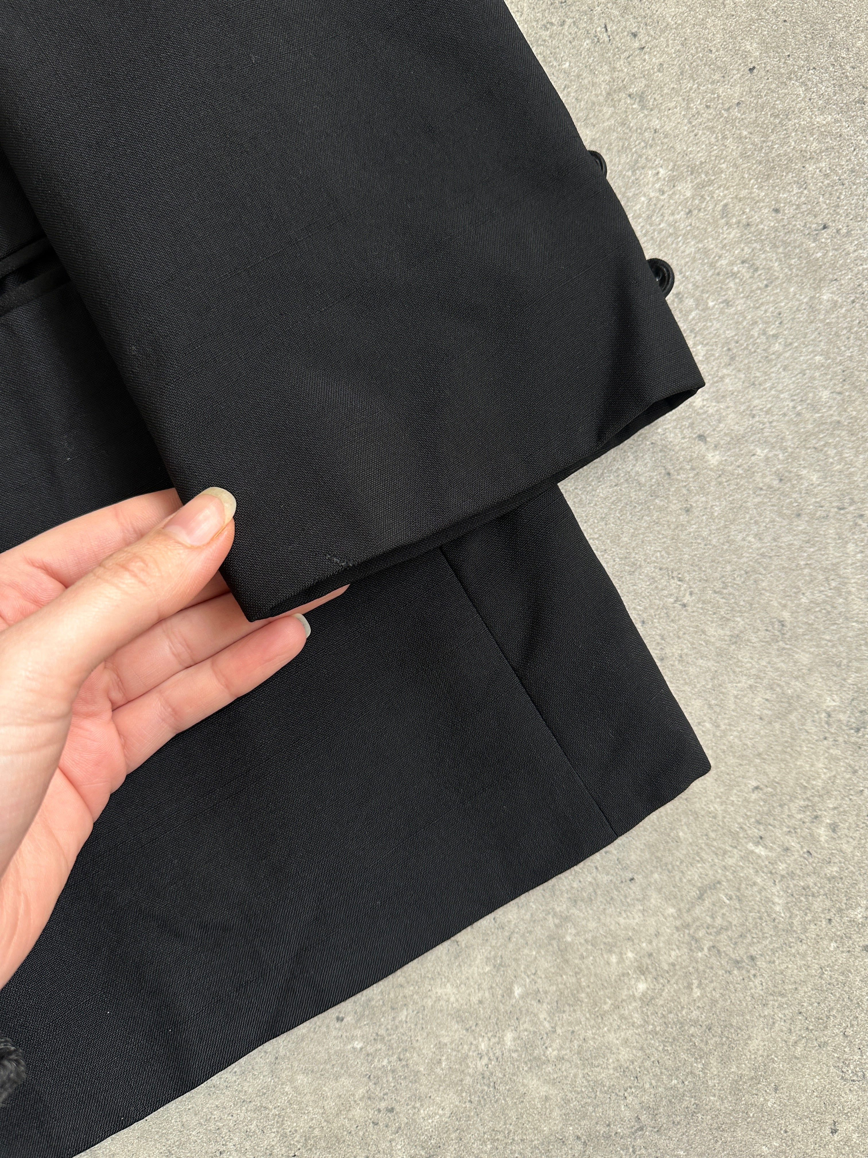 Yves Saint Laurent Pour Homme 1980s wool double-breasted tuxedo blazer in size 44S/XL, displayed on a hanger.