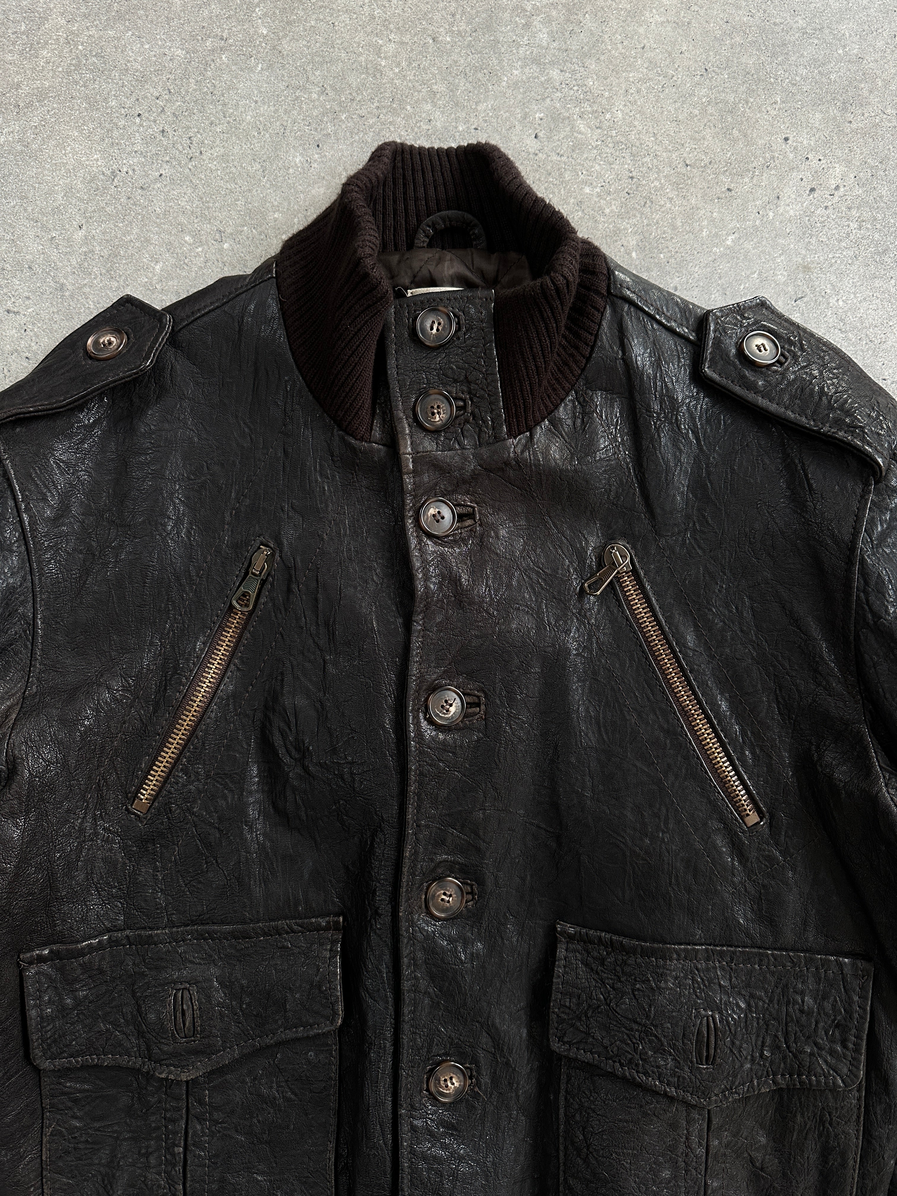 Vintage Italian 2000s textured high neck leather bomber jacket, size large, featuring a stylish high collar and distressed leather finish.