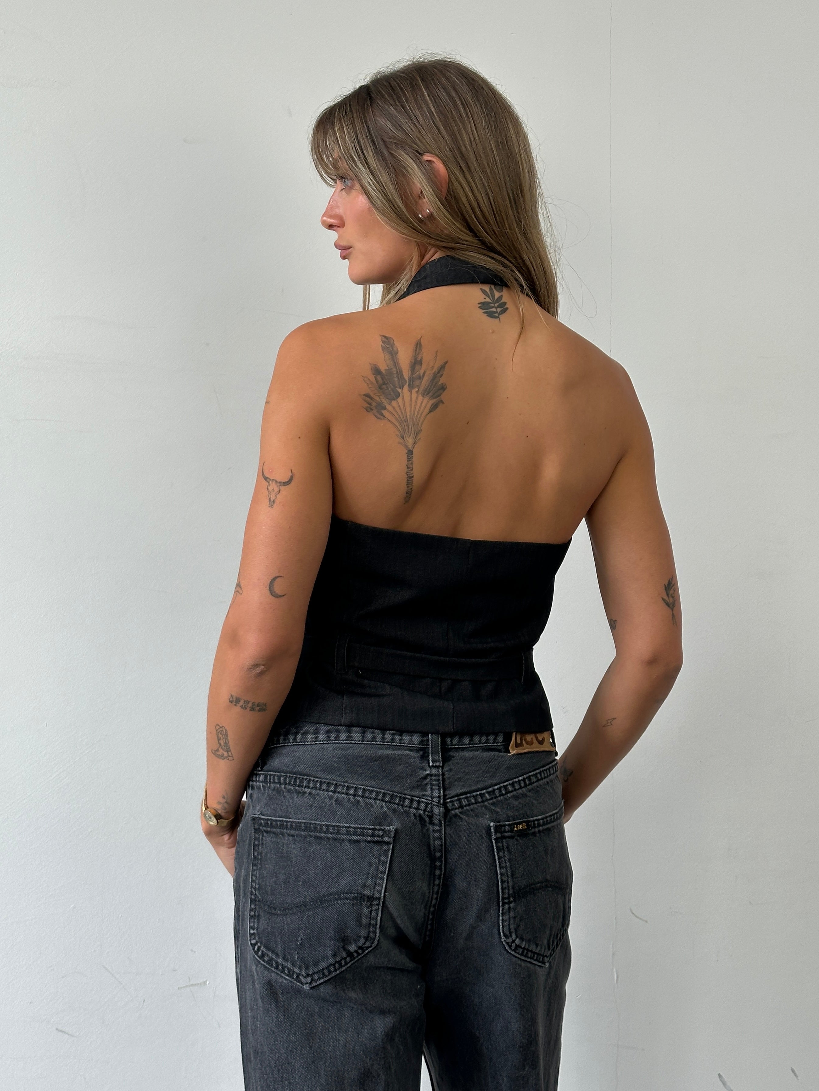 Vintage brand vintage halterneck belted waistcoat, size M, stylish sleeveless vest with belt detail and classic design.