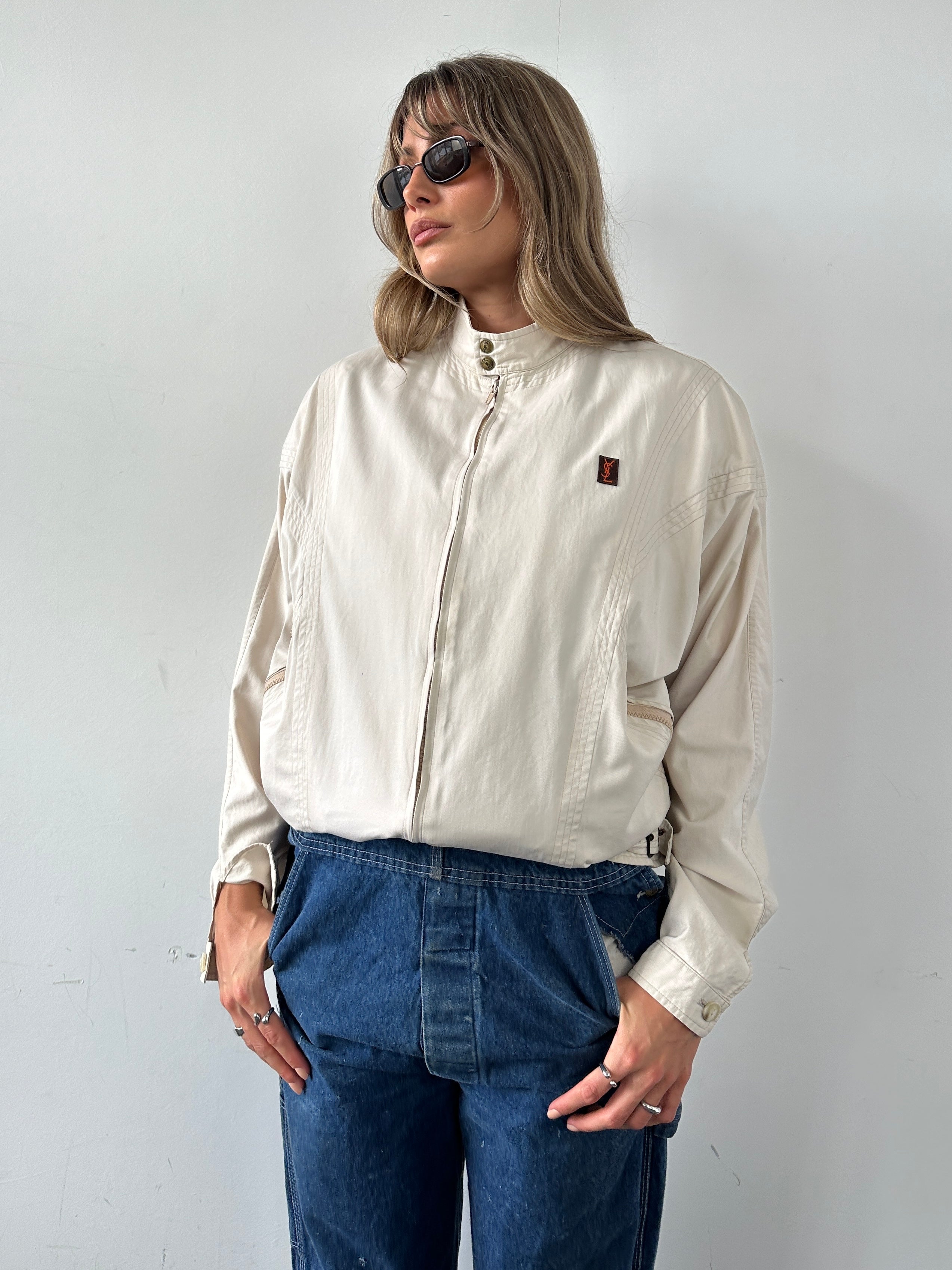 Yves Saint Laurent 70s Logo Bomber Jacket in black, with bold YSL logo, casual fit, and ribbed cuffs and collar.