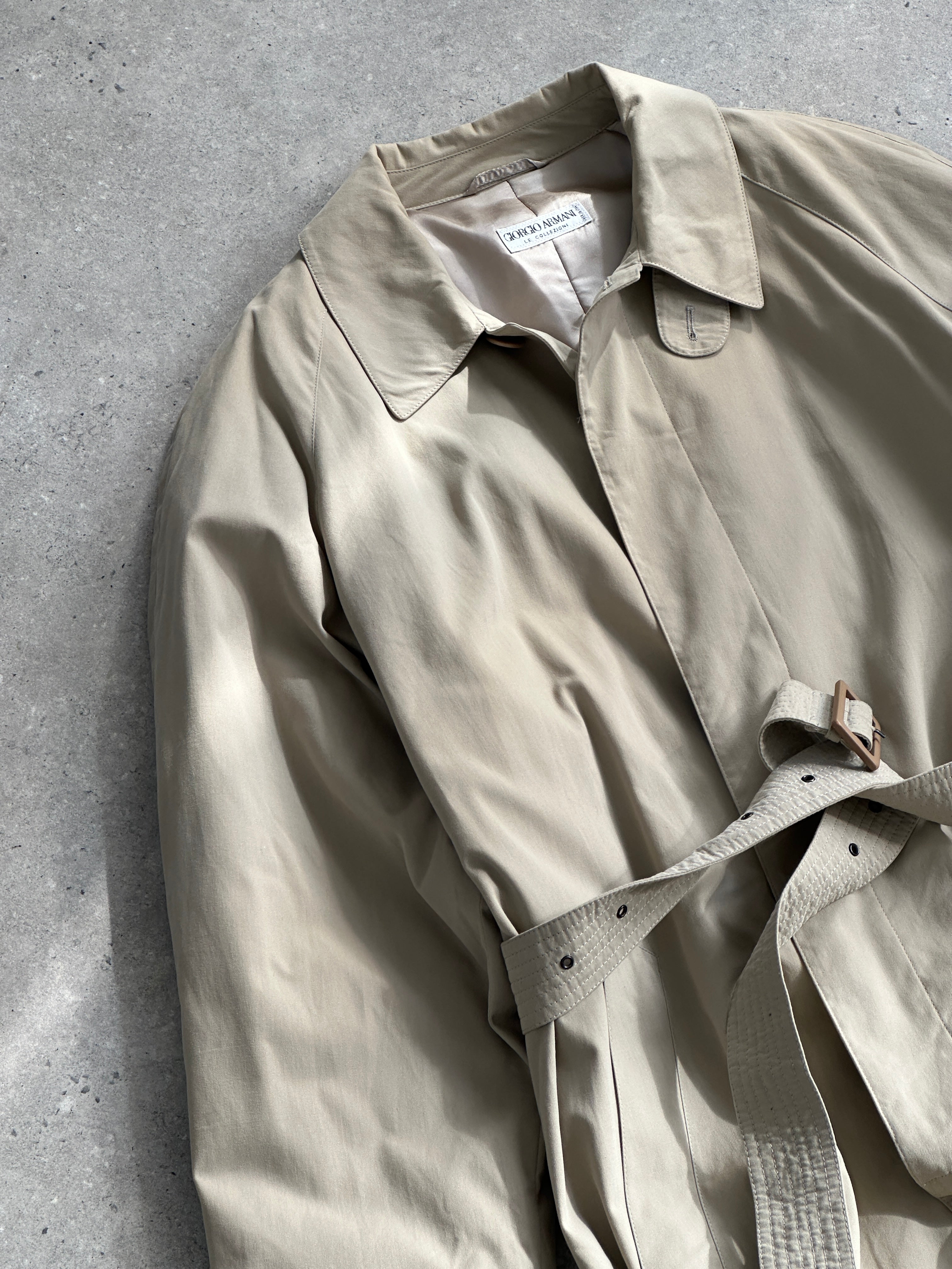 Giorgio Armani Le Collezioni cotton belted trench coat in XXL, beige color, shown on model with classic collar and waist belt.