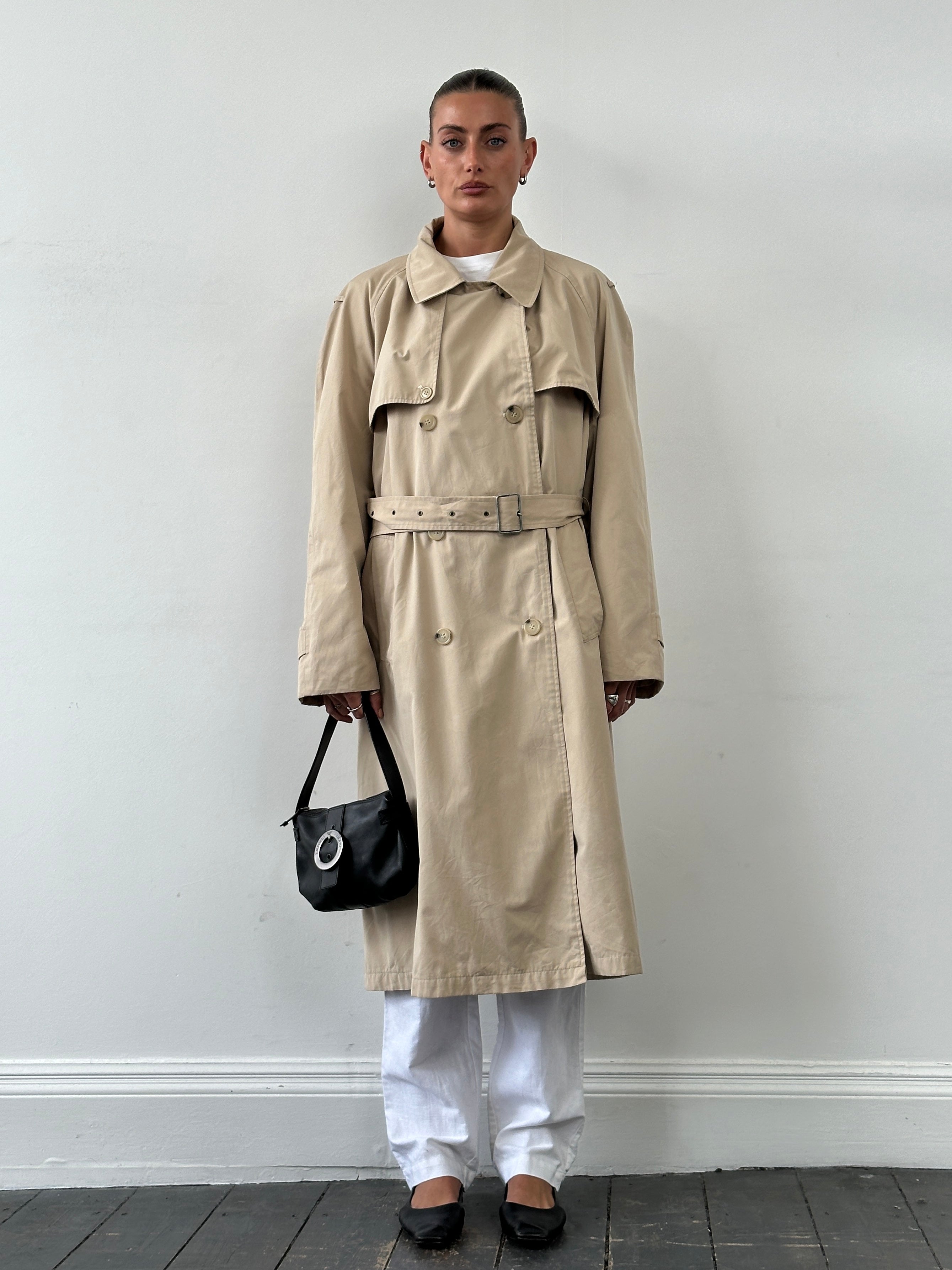 Yves Saint Laurent 70s cotton double-breasted belted trench coat in XL, featuring classic design and tailored fit.