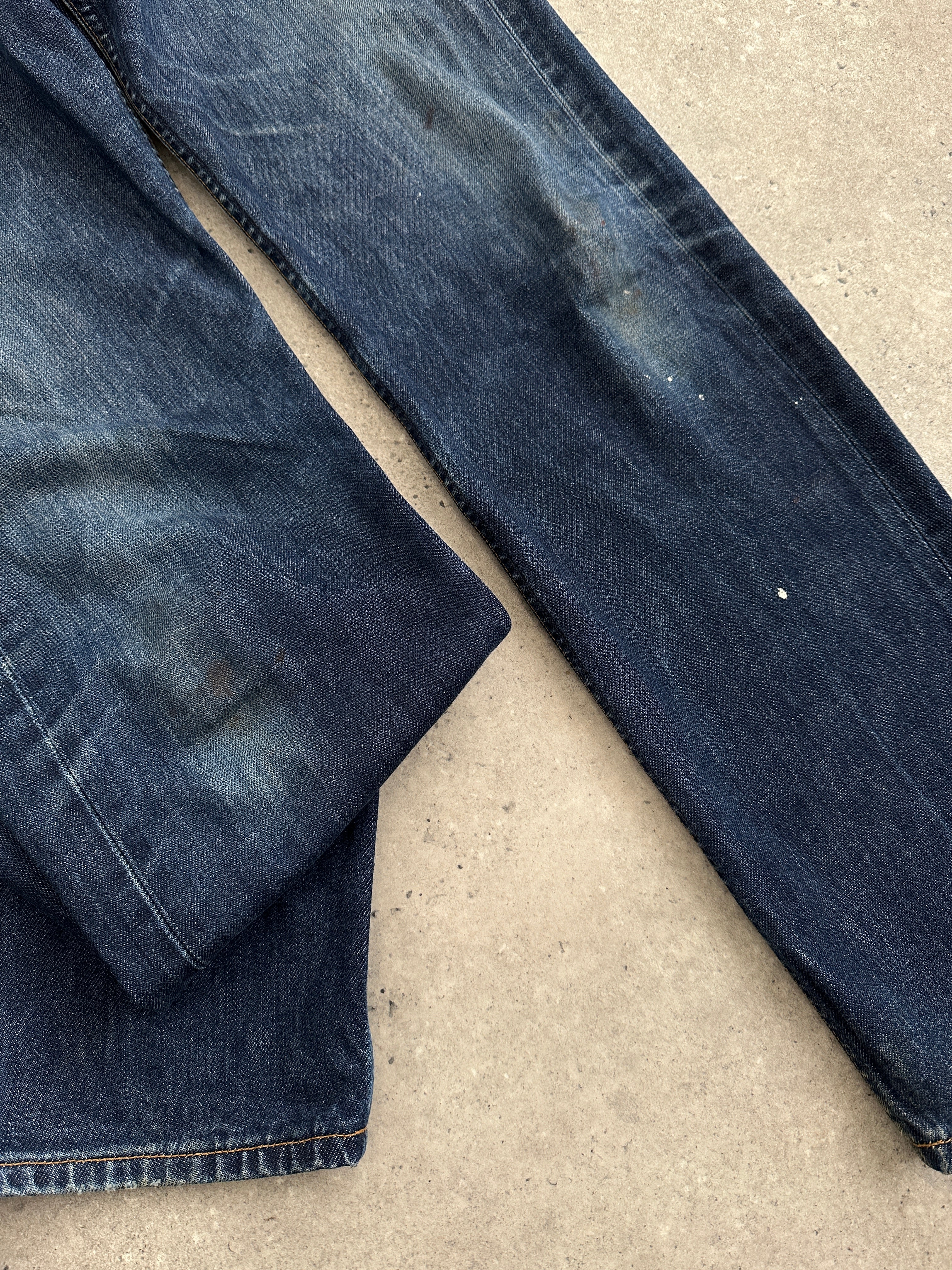 Levi’s 501 distressed straight leg denim jeans in W30, featuring a classic fit with ripped details and a worn-in look.