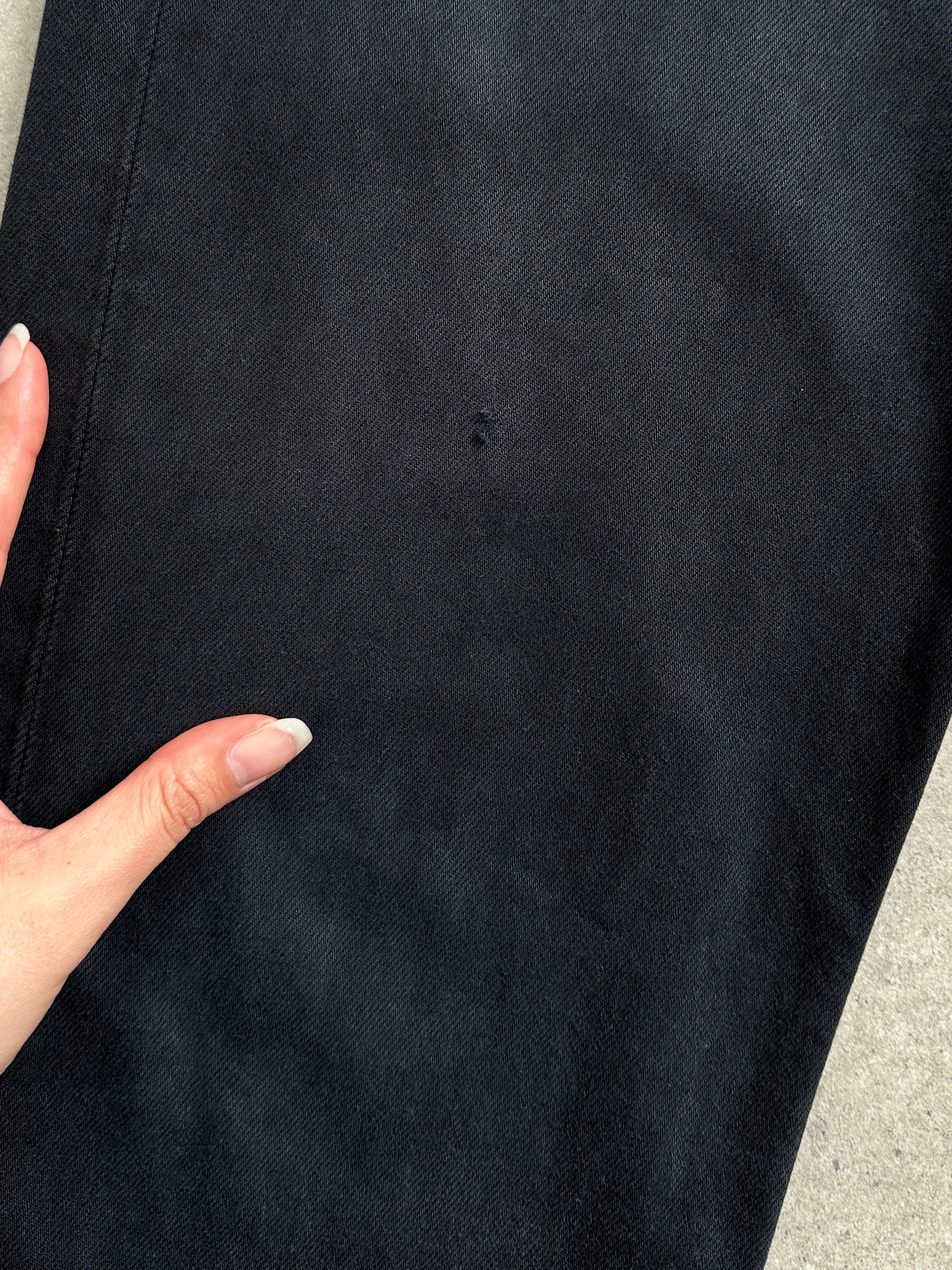Levi’s 501 straight-leg high-waisted denim jeans in W32, showing classic blue denim with a button fly and five-pocket design.