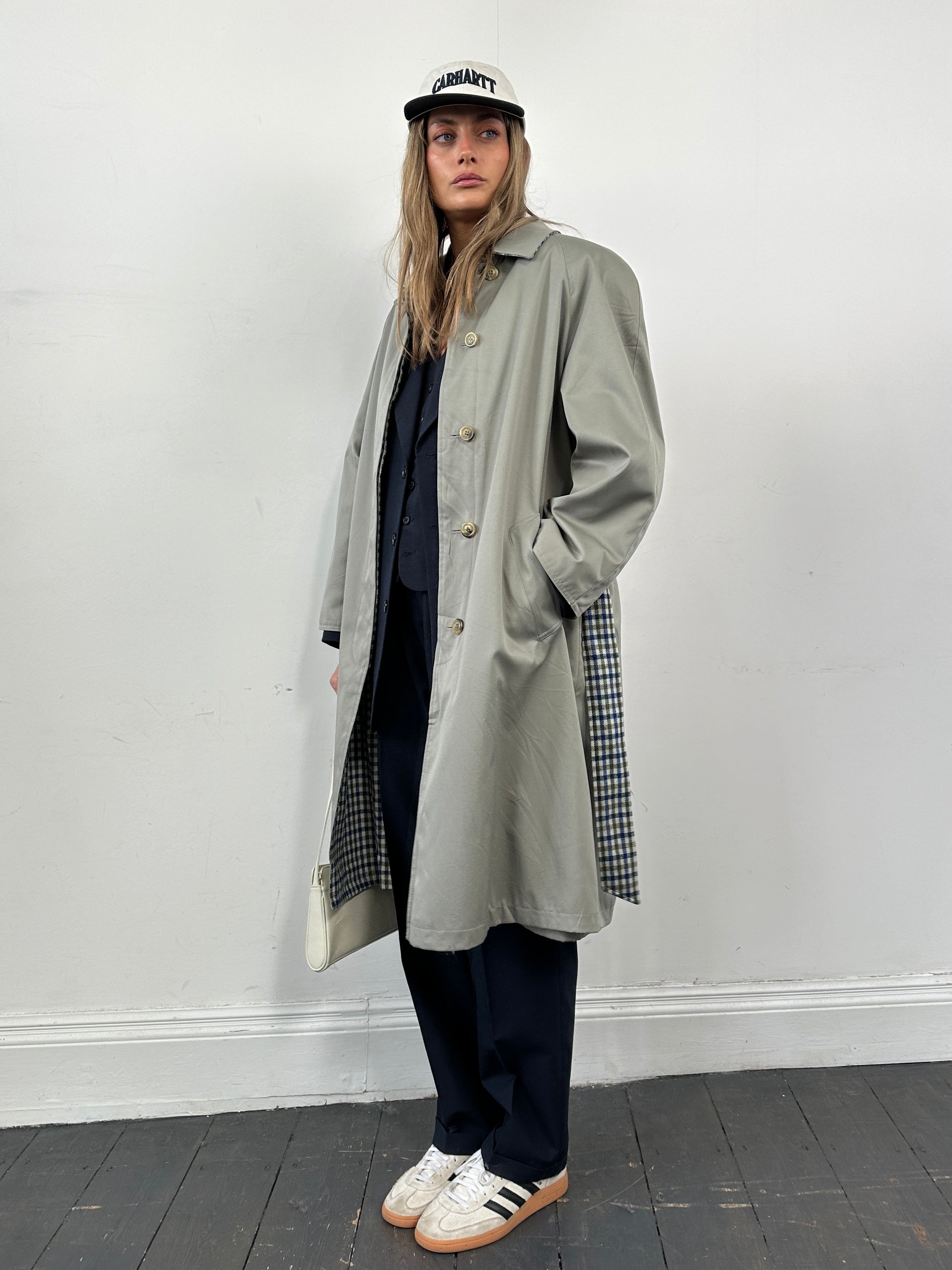 Vintage reversible check trench coat with belt in size M/L, showcasing classic pattern and stylish design.