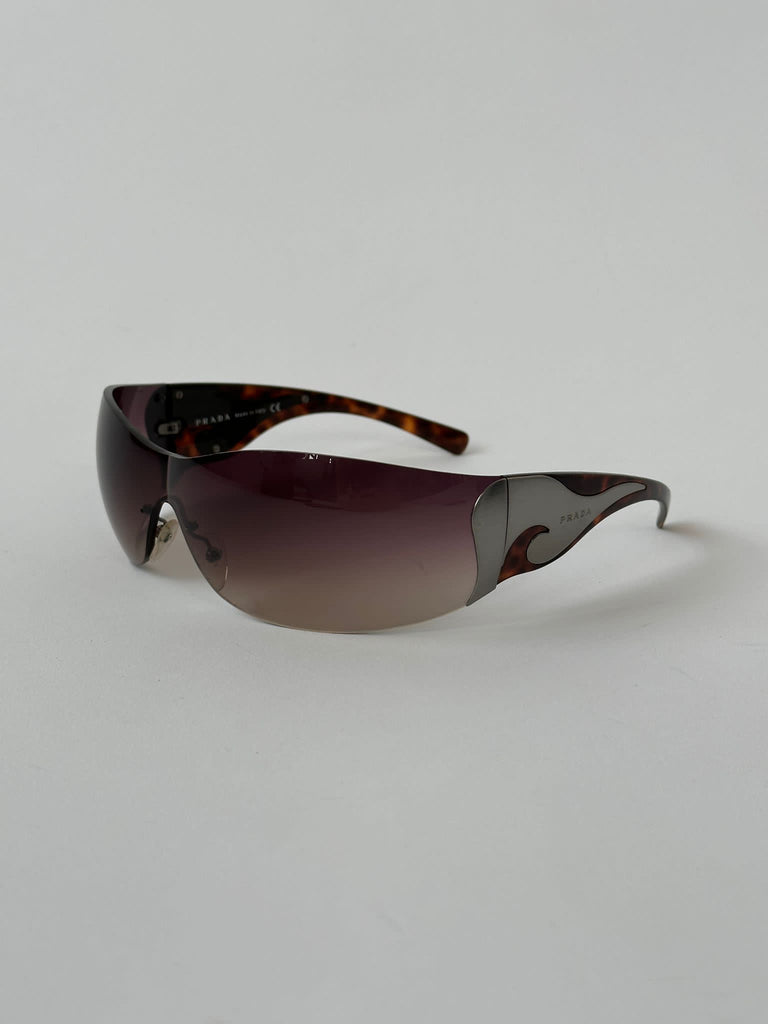 Prada Flame Rimless Wrap Sunglasses - SYLK