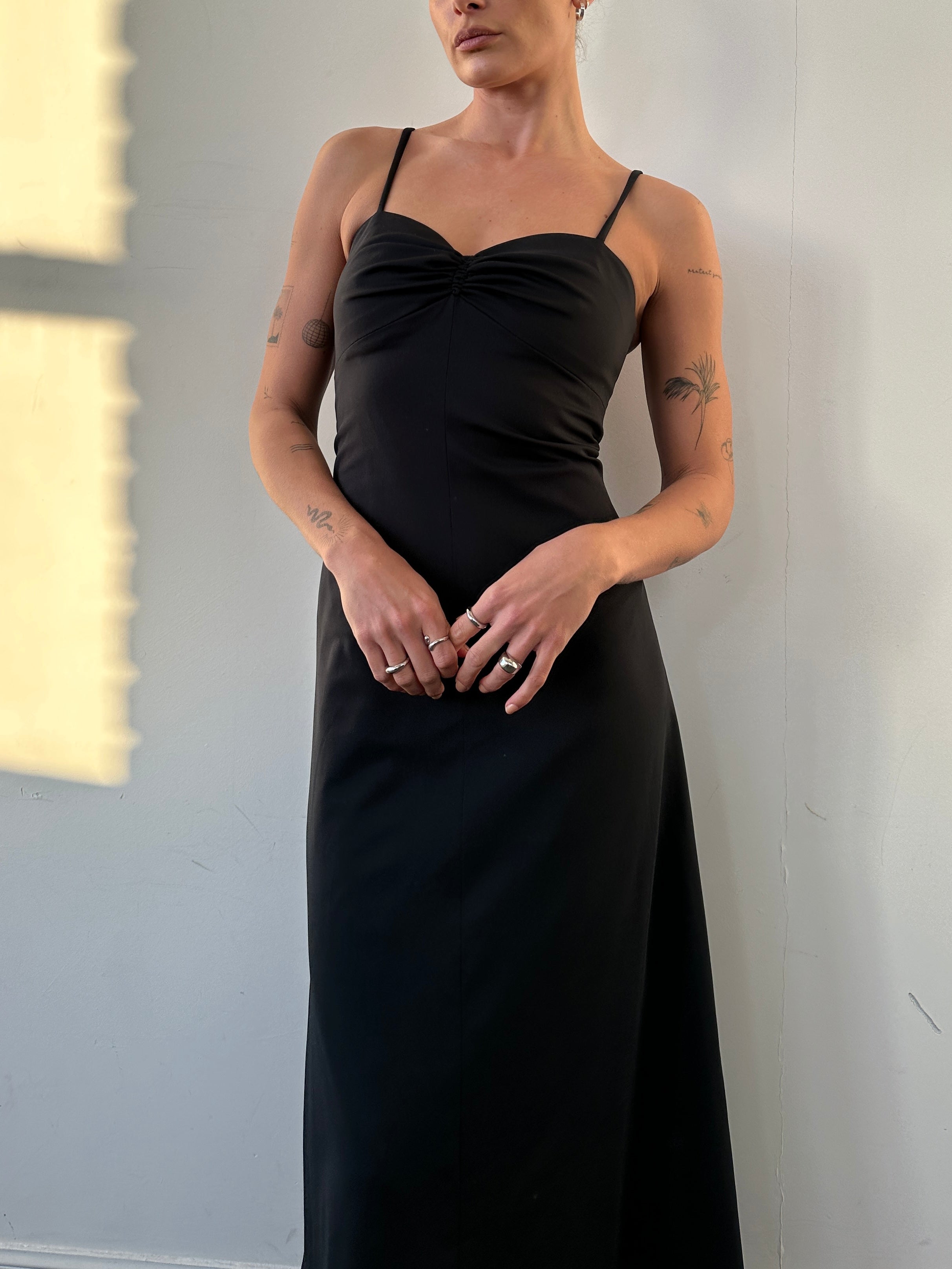 Vintage brand vintage floor-length fitted cami dress in S/M size, showcasing elegant, sleeveless design with a smooth fabric finish.