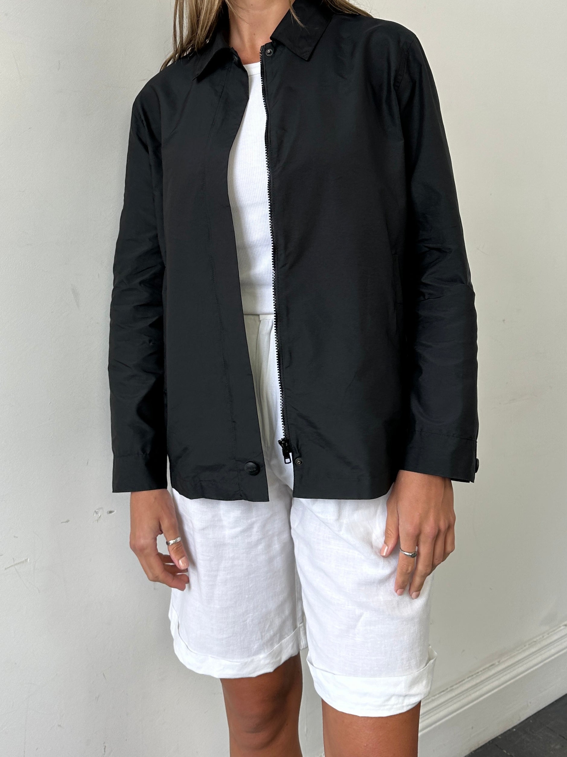 Max Mara Weekend concealed placket bomber jacket in size M, stylish black bomber jacket with smooth fabric and minimal design.