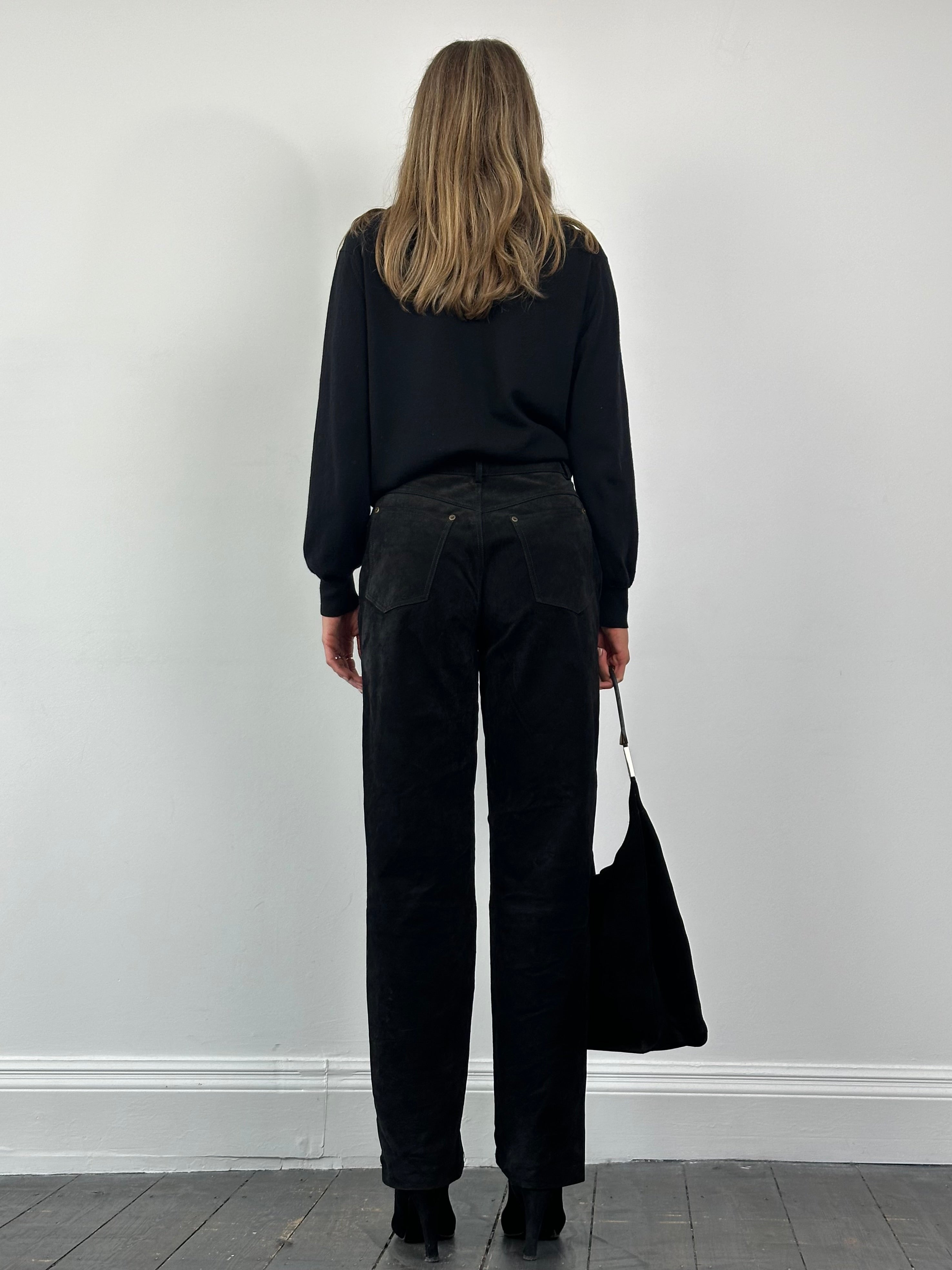 Vintage high waisted suede trousers in W26, featuring a classic fit and textured suede fabric, shown on a neutral background.