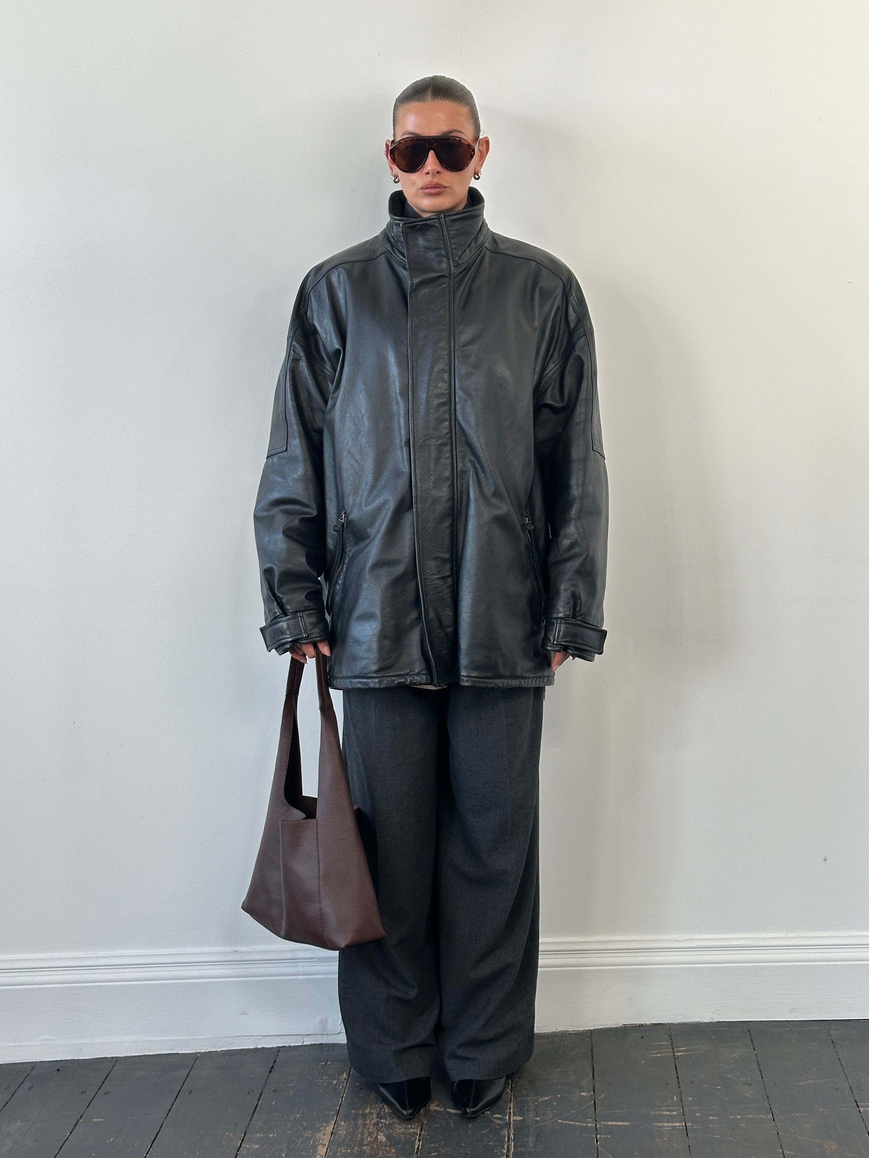 Armani Jeans 2000s black leather jacket with high neck and double zip closure, XXL size, stylish and sleek design.