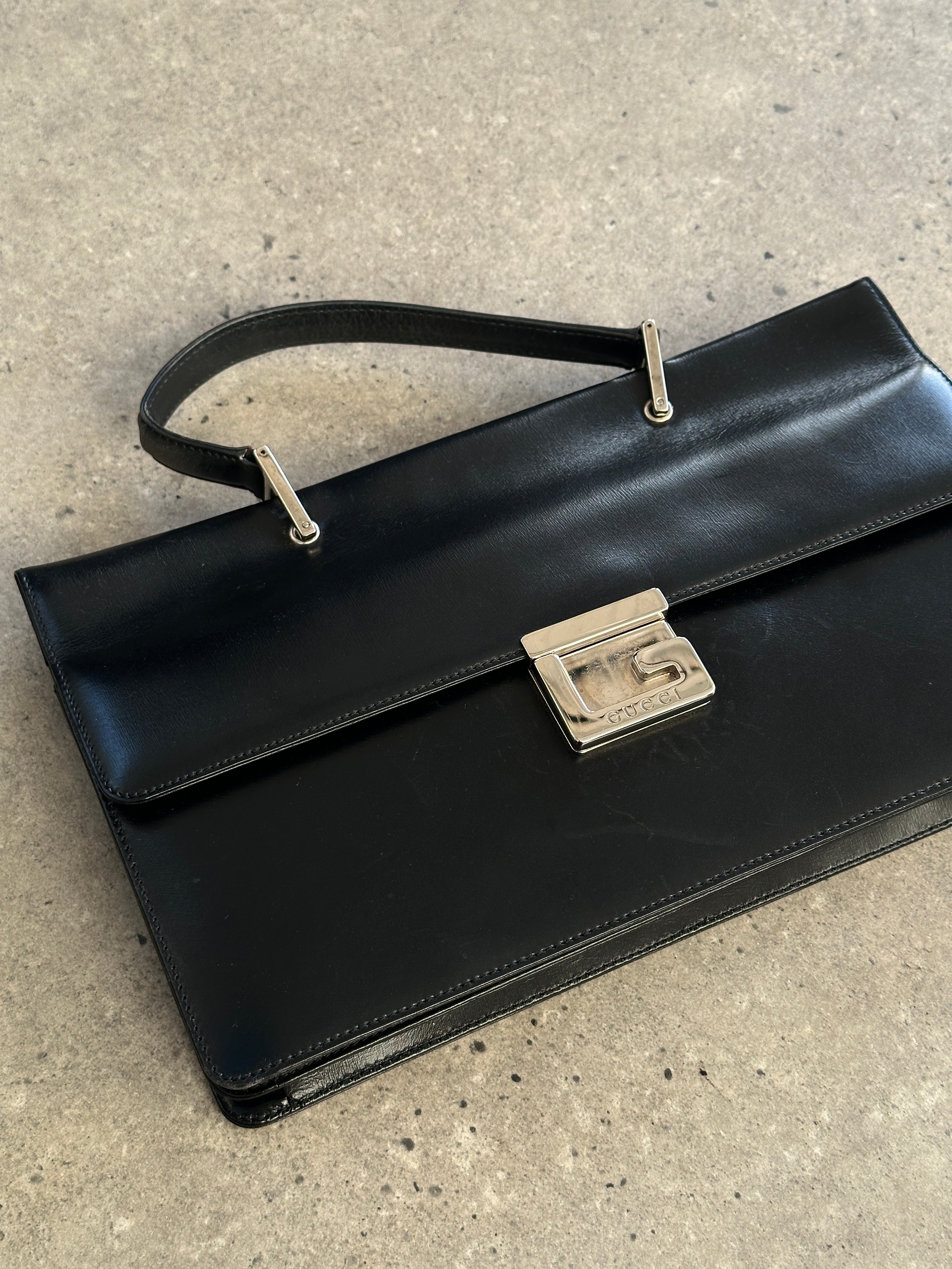 Gucci 1990s Tom Ford Square G leather handbag with structured design and gold-tone hardware.