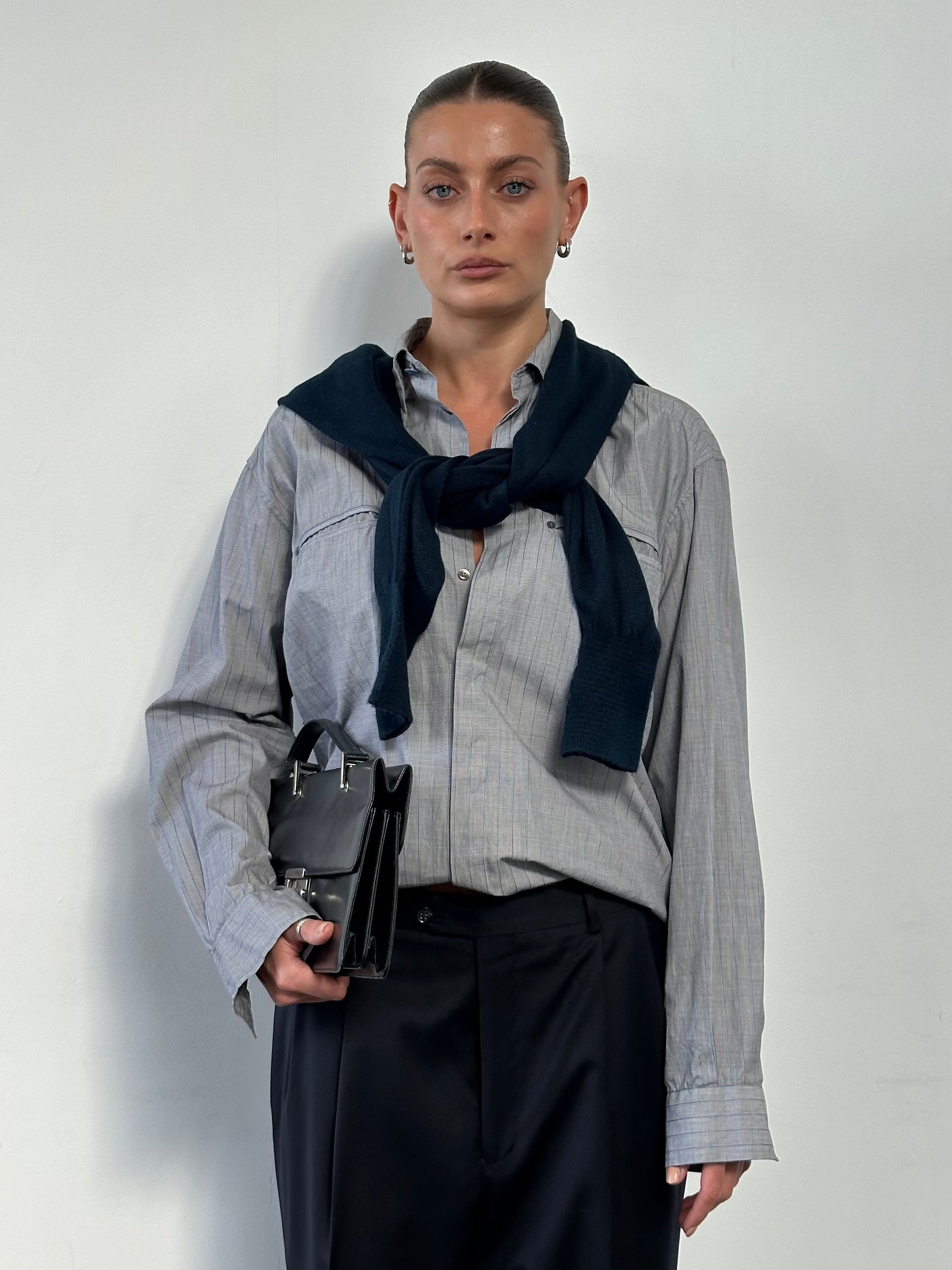 Versace Versus 90s bespoke cotton shirt with button stripe pattern, long sleeves, in size L, displayed on a hanger.