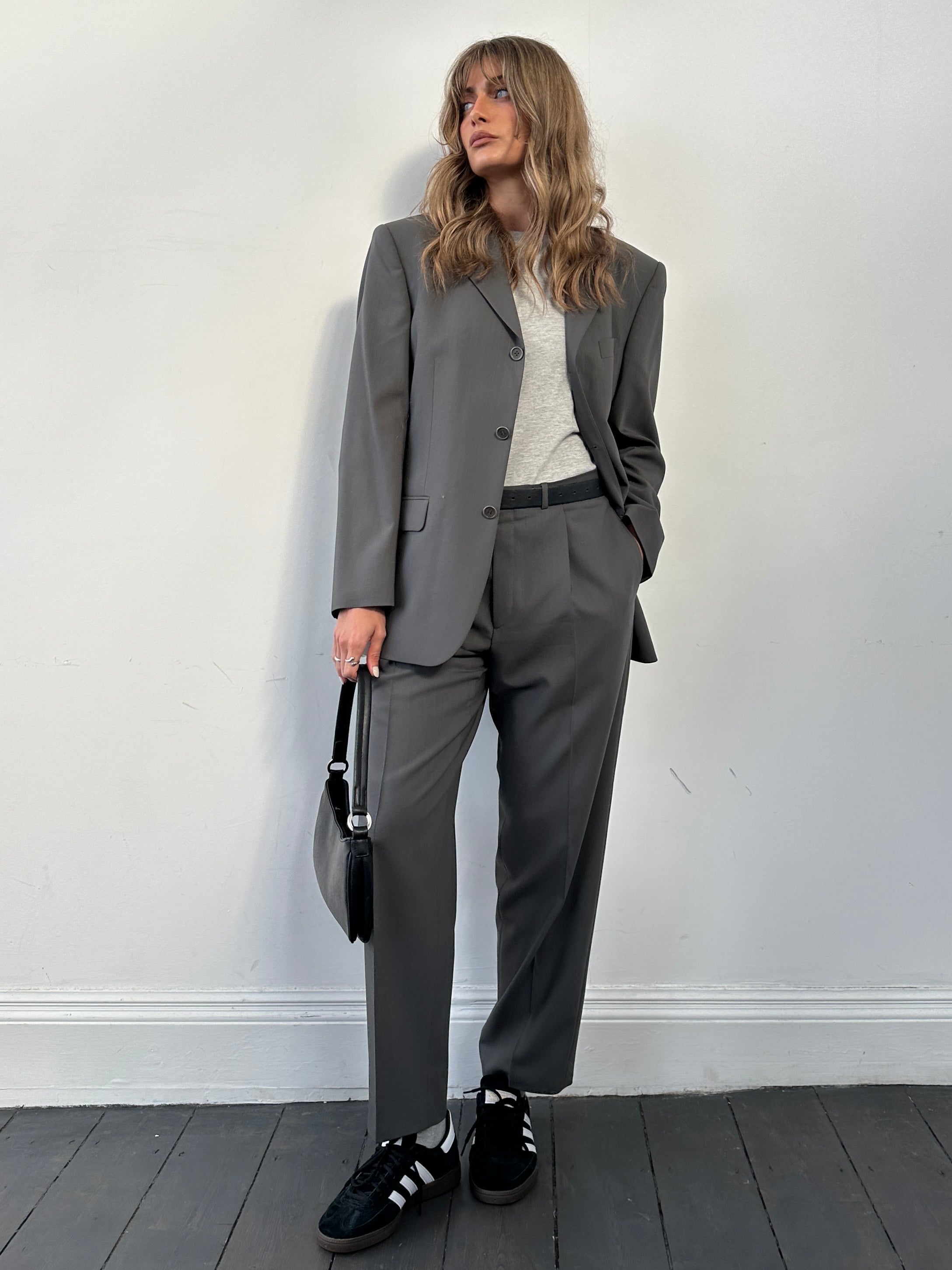 Balmain pure wool single-breasted jumpsuit in size 38S/W32, tailored fit with lapel collar and classic design.