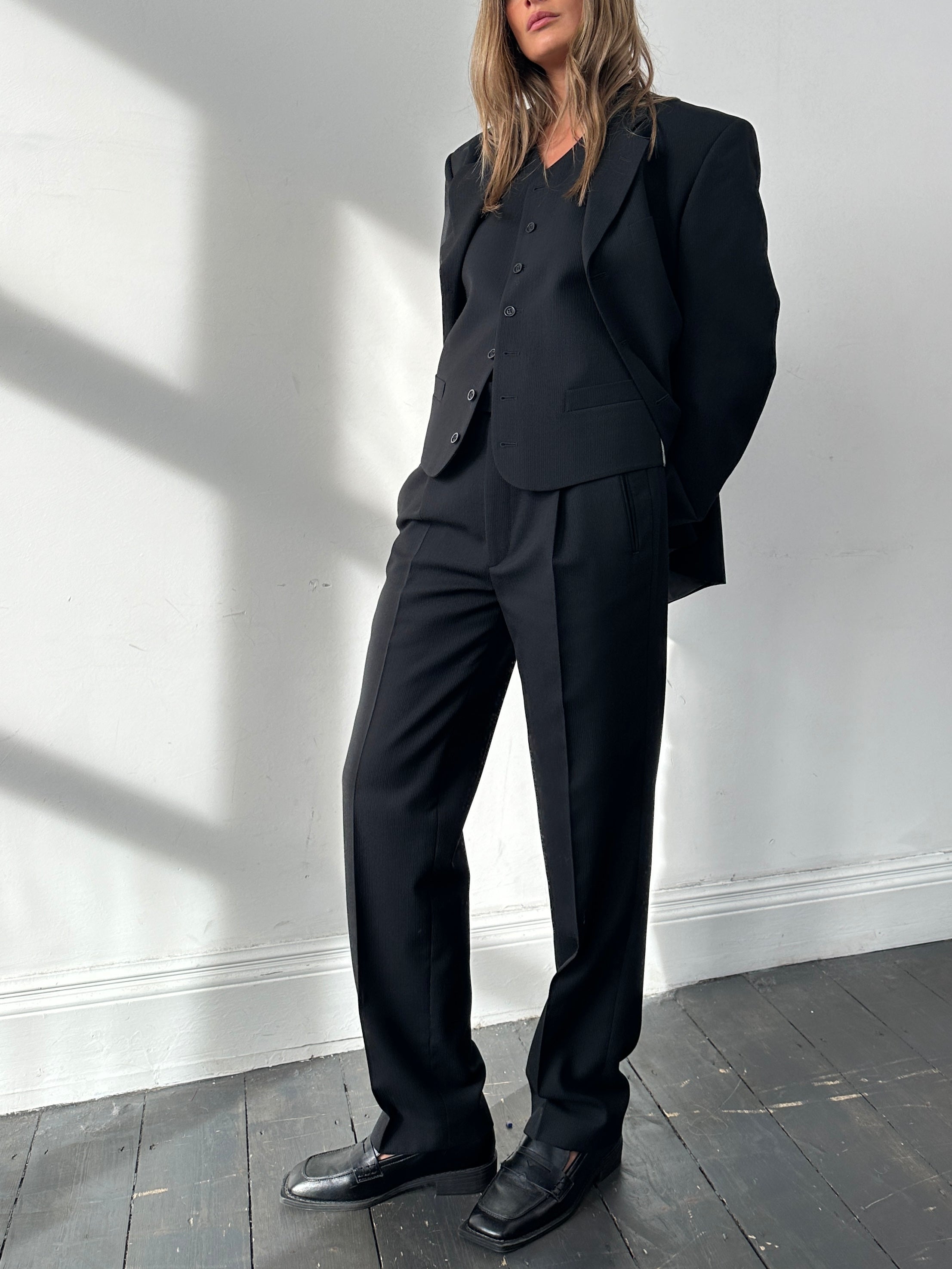 Vintage wool ribbed three-piece suit in size 38R/W30, featuring tailored jacket, vest, and trousers in classic style.