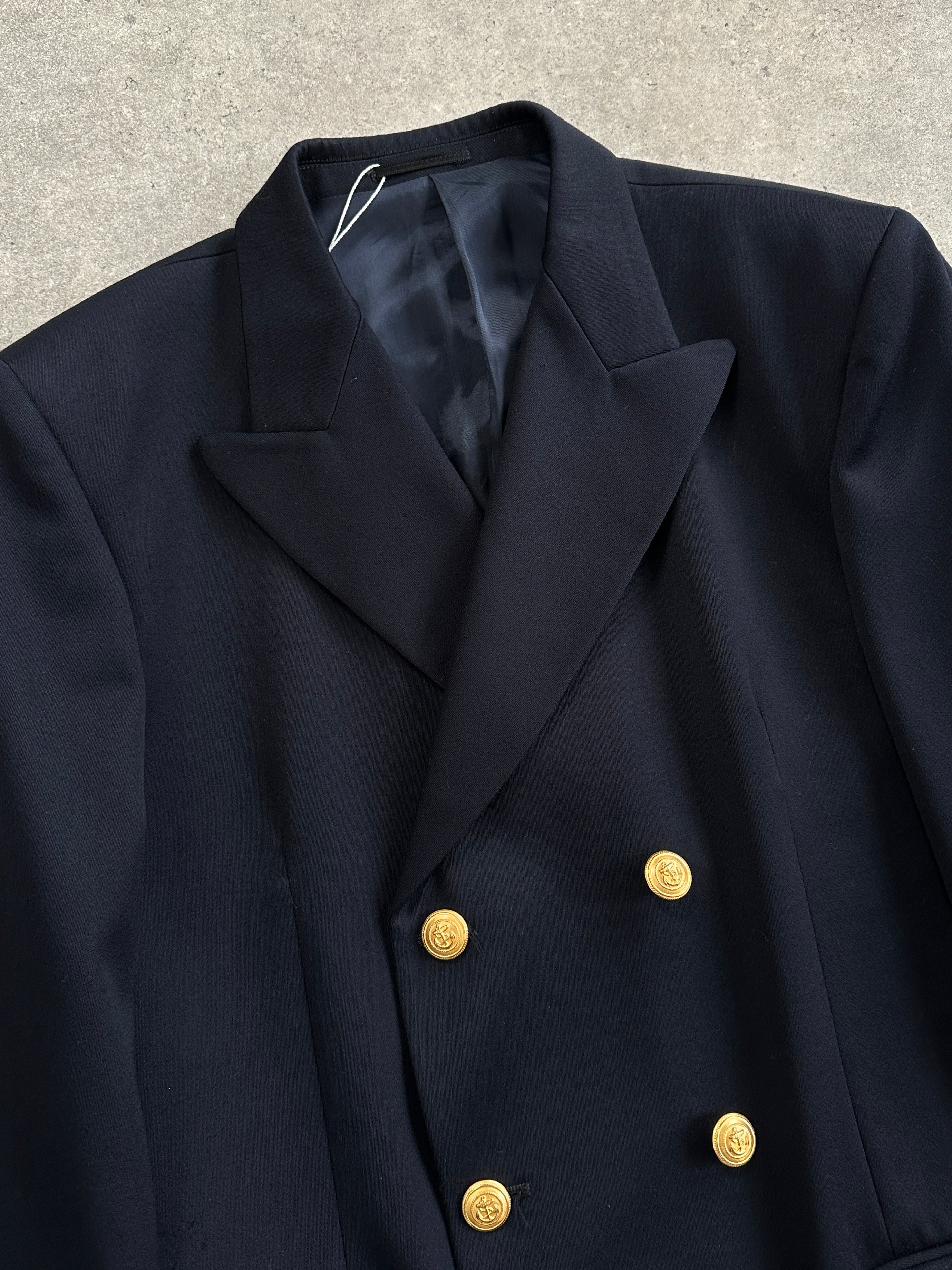 Vintage bespoke button wool double-breasted blazer in size 42L, tailored fit with classic lapel and structured design.