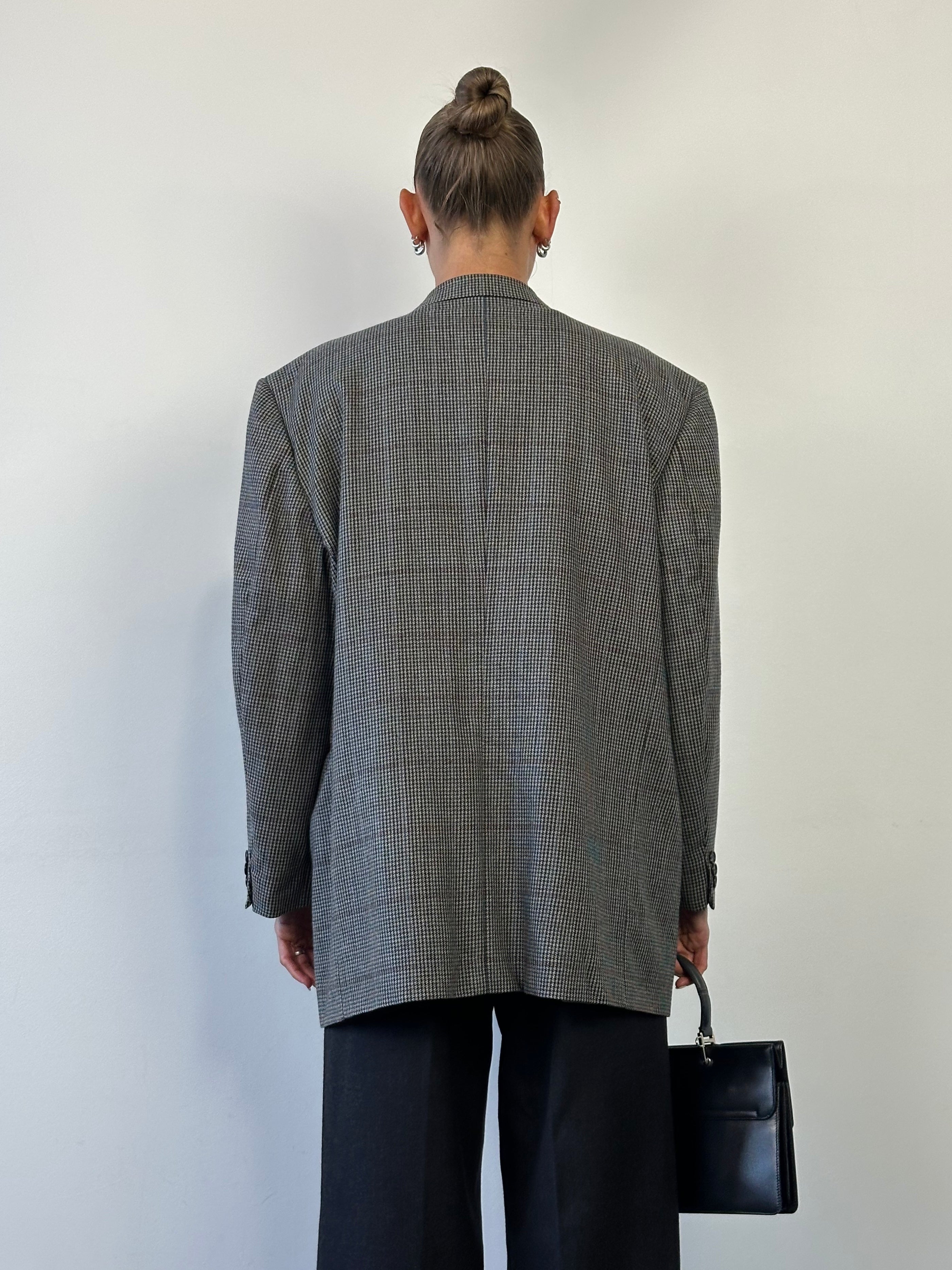 Christian Dior Monsieur wool blazer with dogtooth pattern, single-breasted design in size 50R/XXL, shown on a hanger.