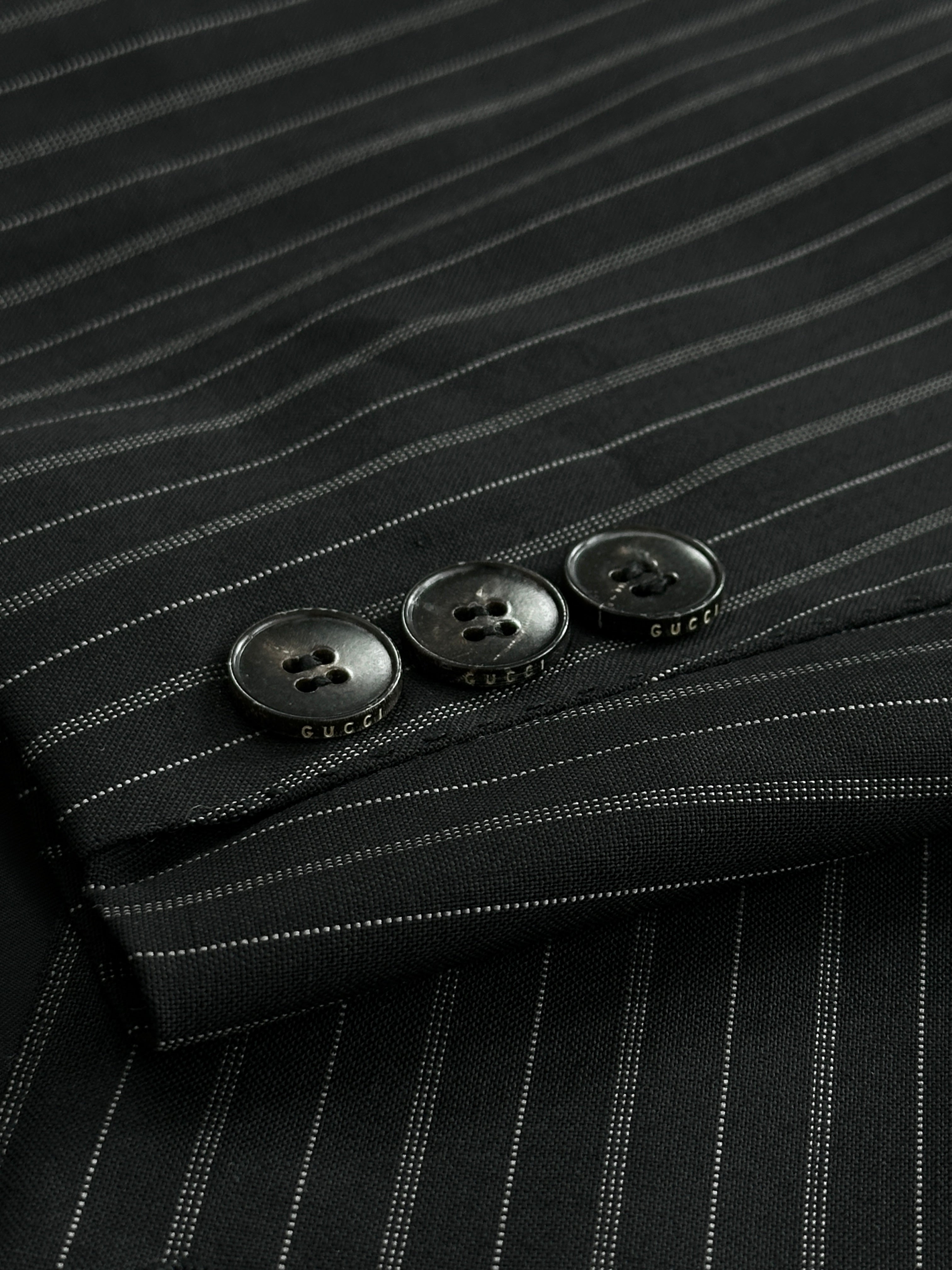Gucci wool striped dagger collar blazer in size M, tailored fit with bold stripe pattern and classic blazer design.