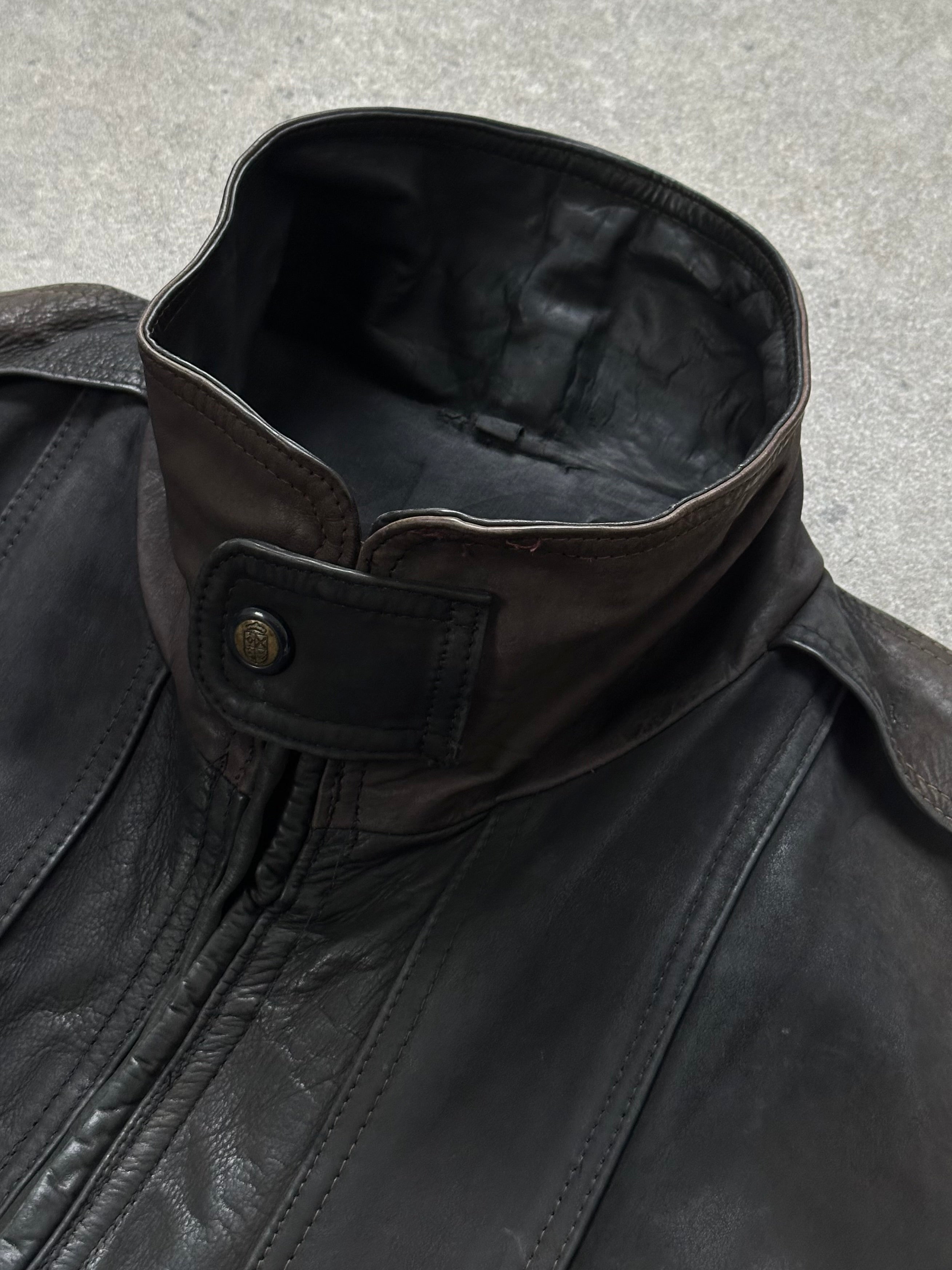 Vintage 1990s aged leather bomber jacket in XL, showcasing distressed leather and classic bomber style.