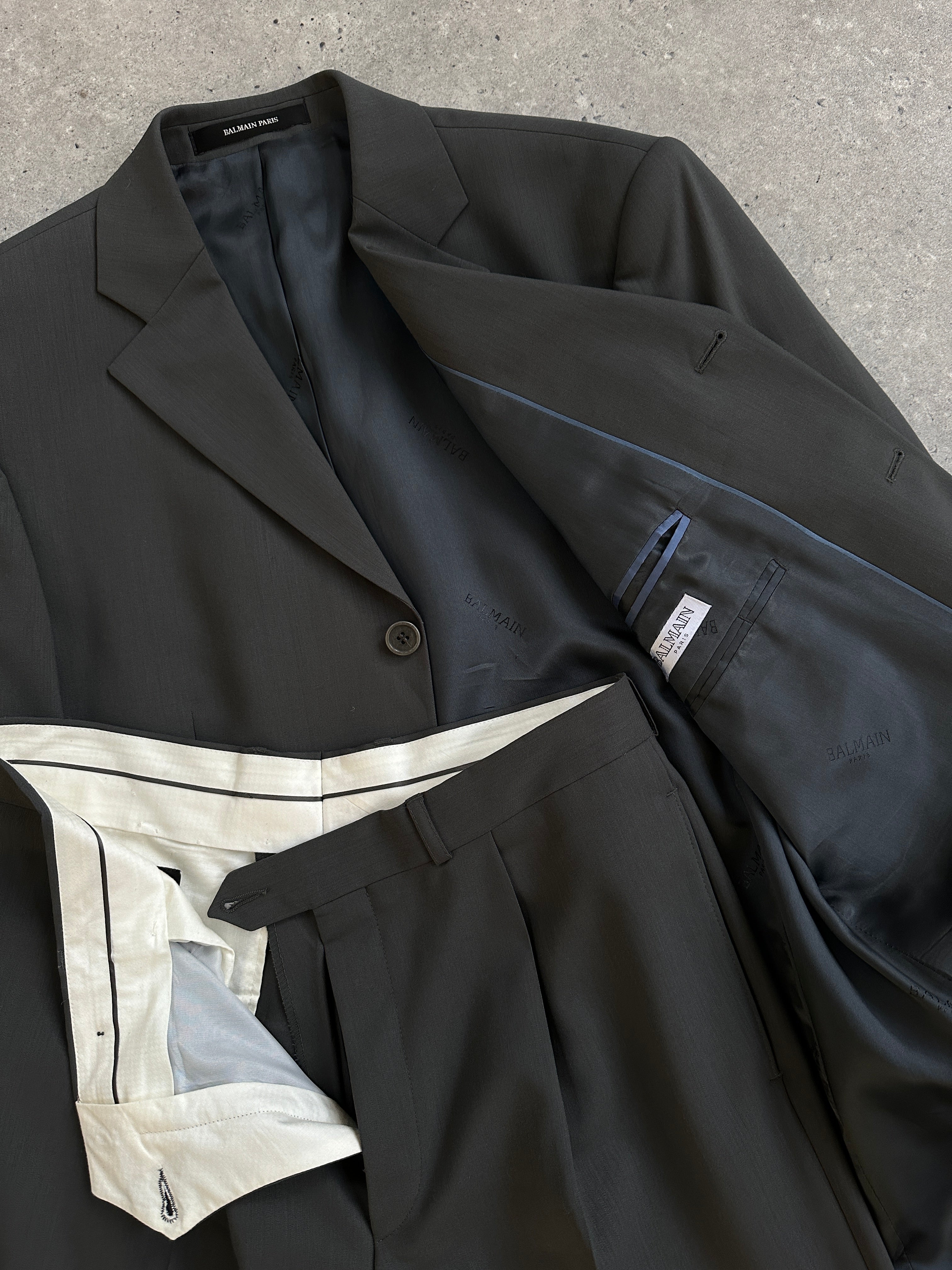 Balmain pure wool single-breasted suit jumpsuit in size 38S/W32, tailored fit with classic lapel and sleek design.