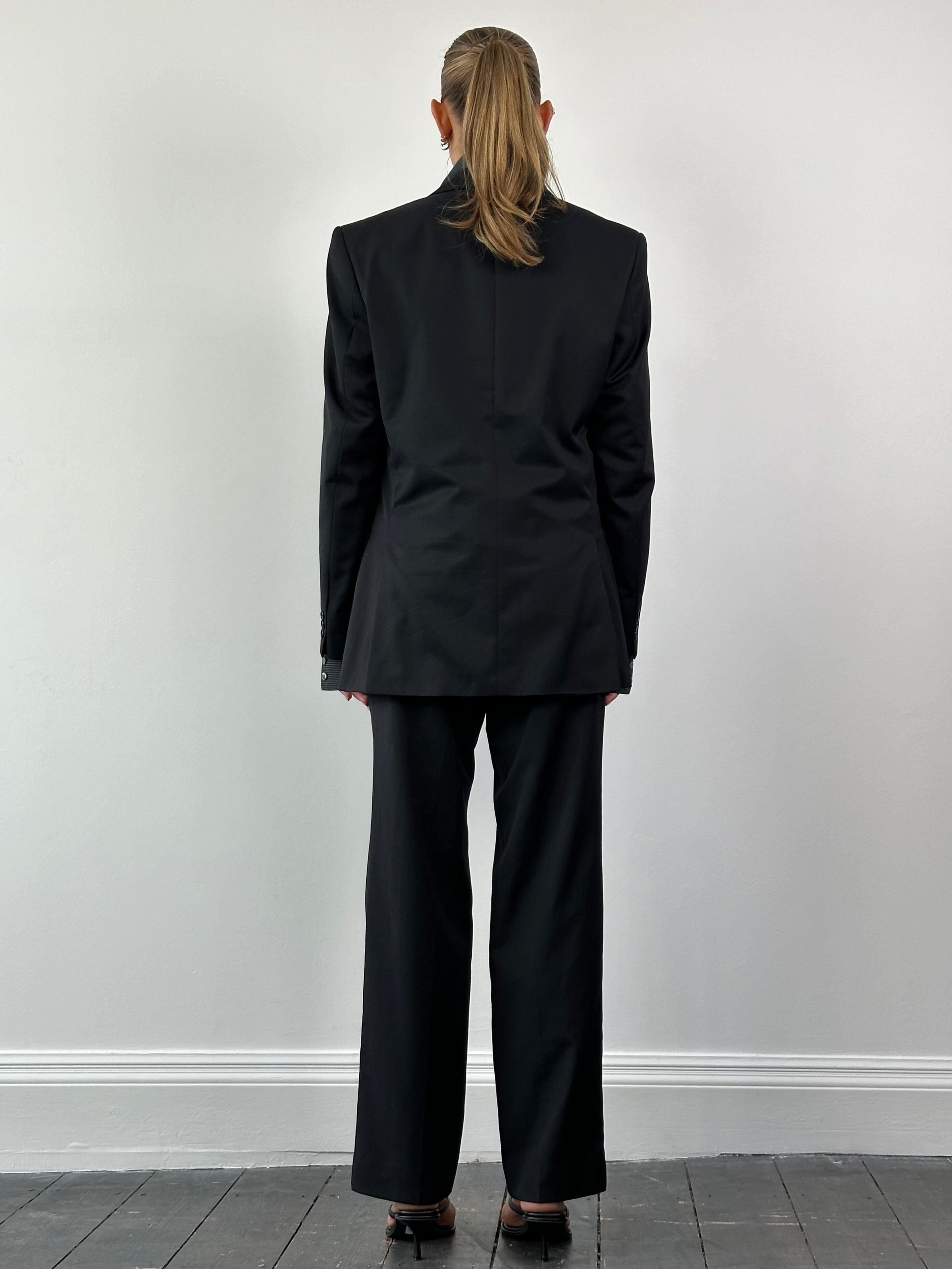 Pierre Cardin wool single-breasted suit jacket in dark fabric, featuring notch lapels and tailored fit, size 38L/W36.