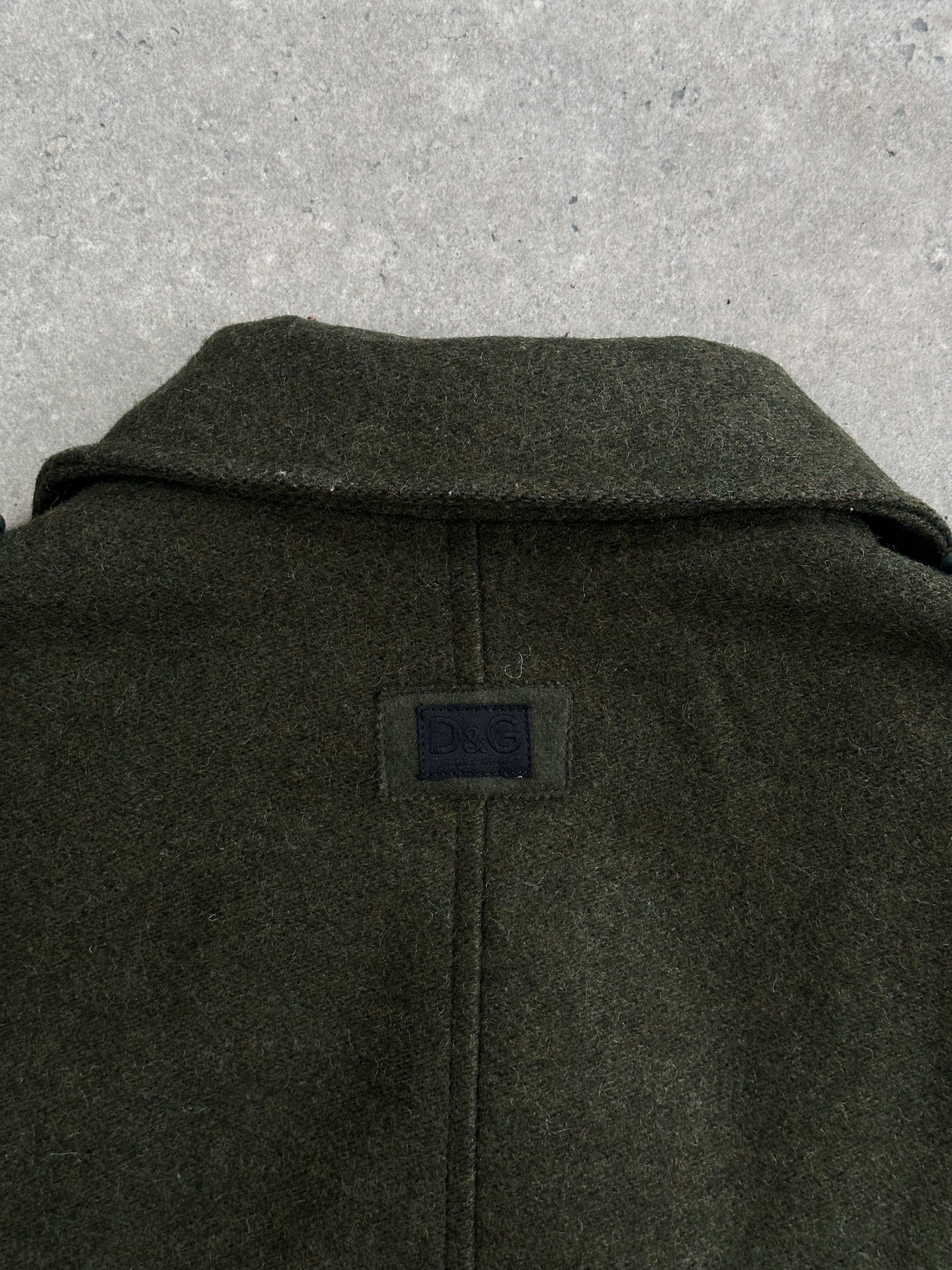Dolce & Gabbana 1990s wool double-breasted coat in size L/XL, featuring classic tailored design and stylish lapels.