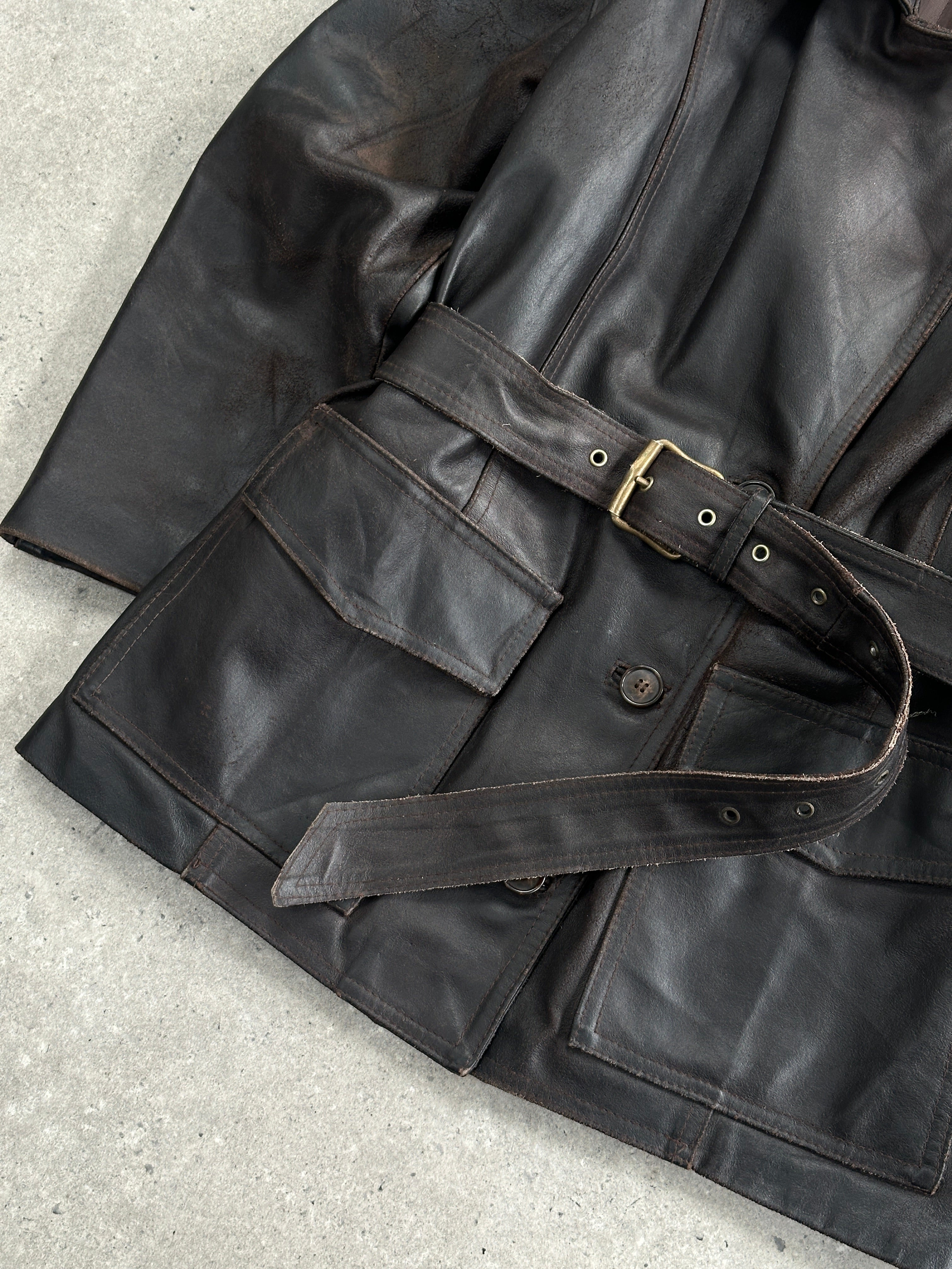 Vintage Italian 1980s belted leather jacket, size M, styled with classic design and visible belt details.