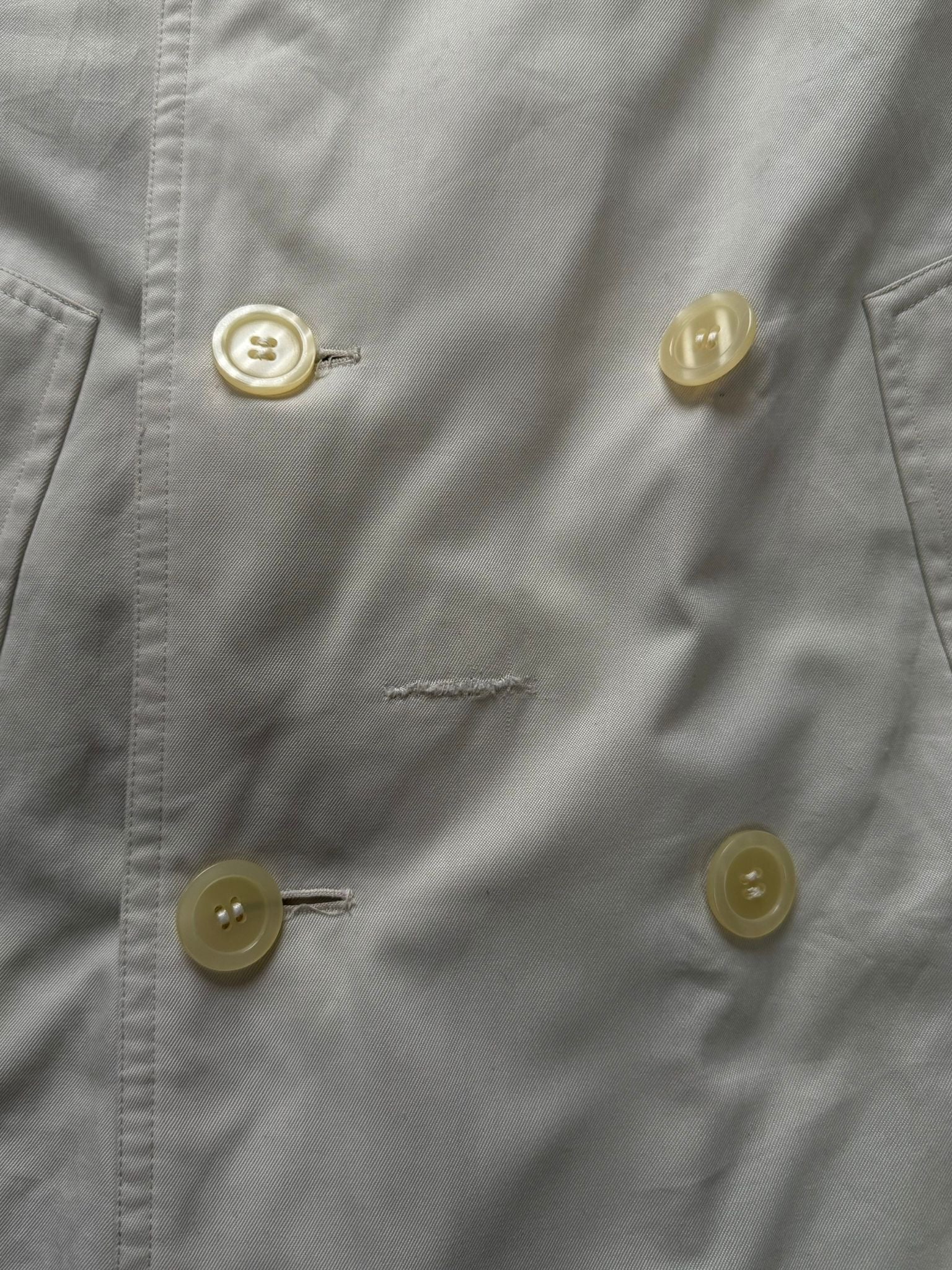 Burberry 1990s cotton double-breasted trench coat in beige, classic design with belt and shoulder epaulets, size M/L.