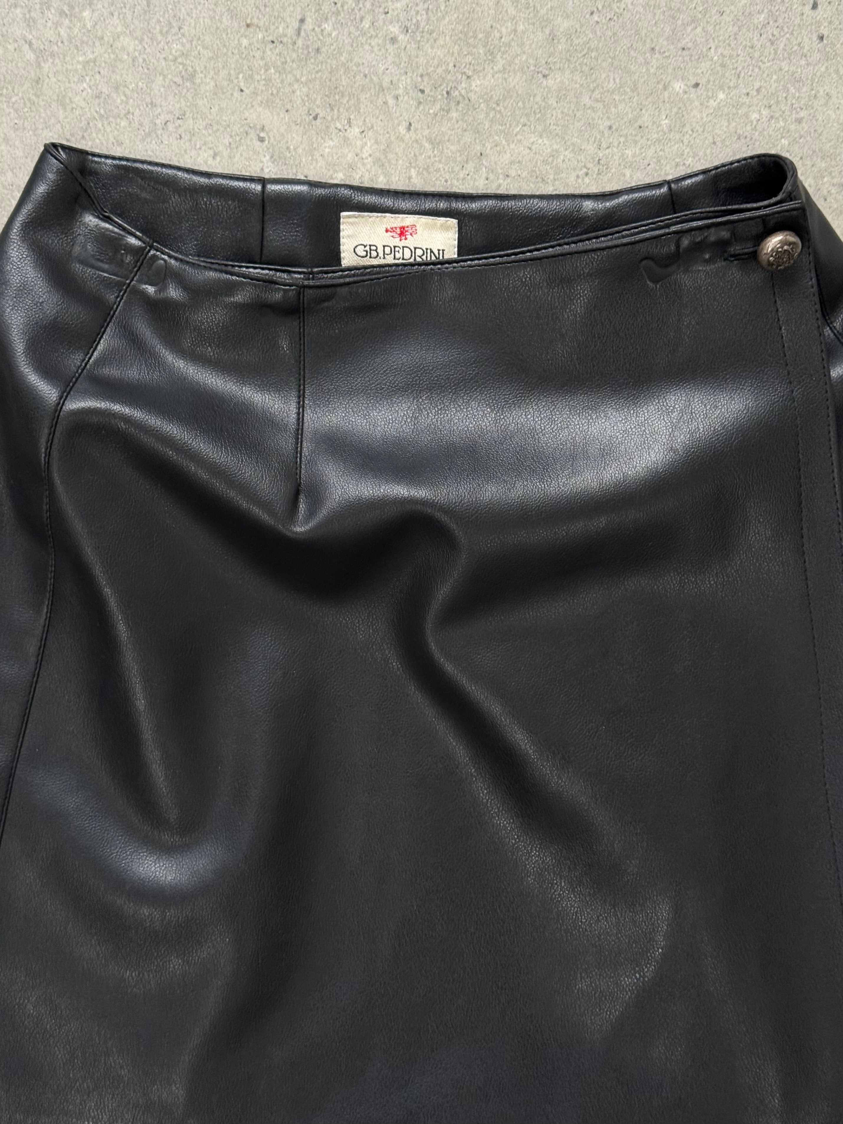 Vintage faux leather wrap mini skirt, W25, showing the textured black material and stylish design on a plain background.