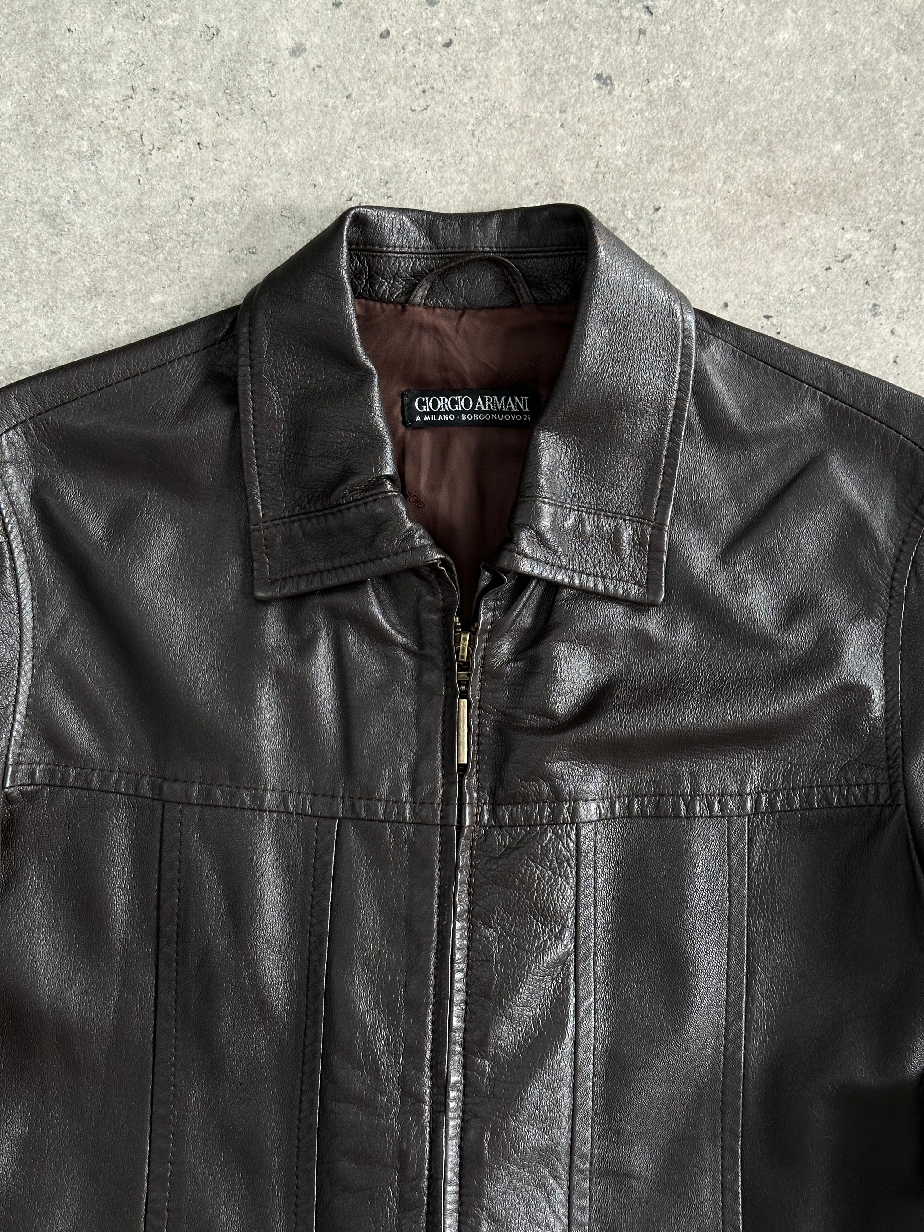 Giorgio Armani Black Label belted leather jacket in black, featuring a classic collar and stylish design, size S/M.