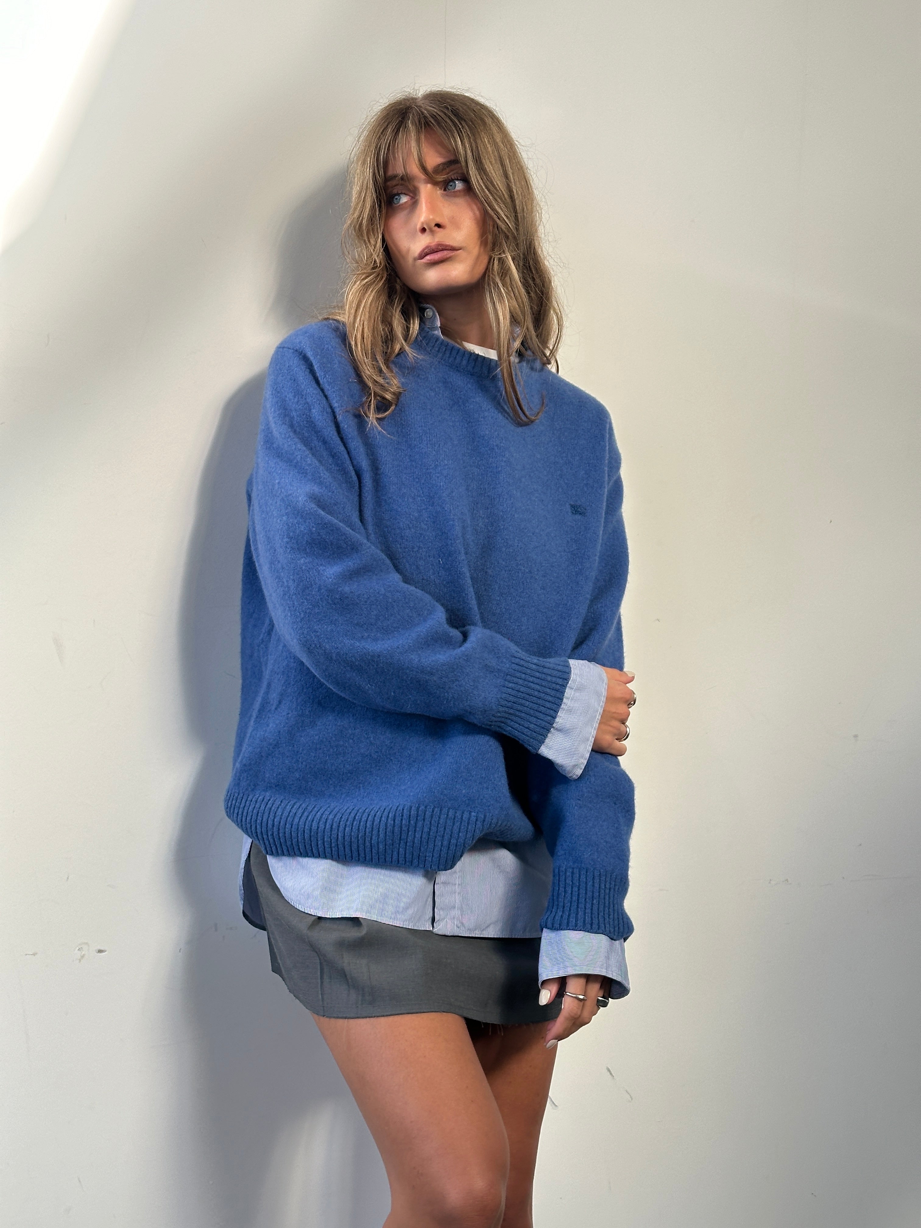 Burberry London pure wool logo jumper in size L, featuring the classic Burberry check pattern and a prominent embroidered logo.