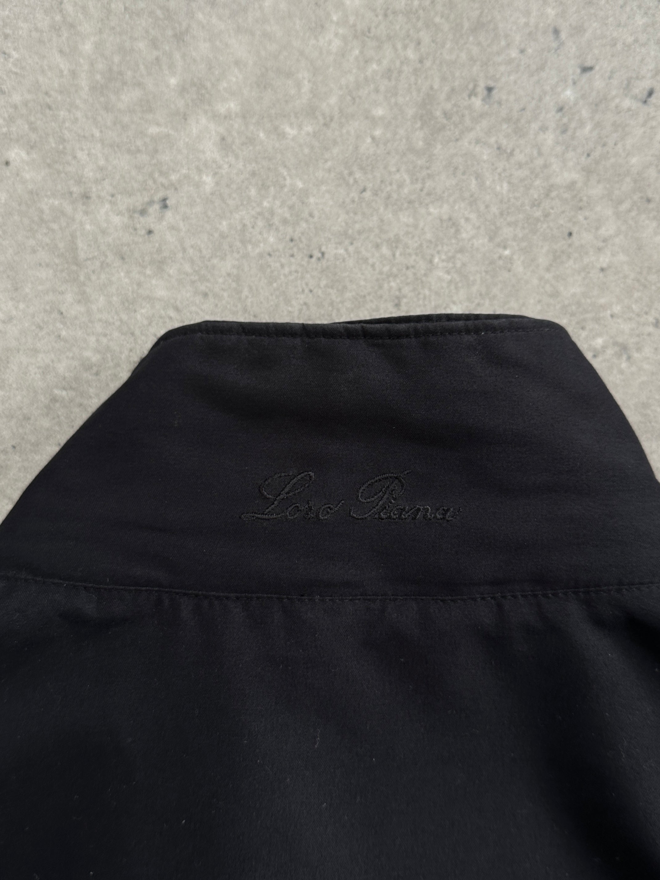 Loro Piana Storm System Traveller jacket in size XL, shown in a sleek, weather-resistant design with a modern fit.